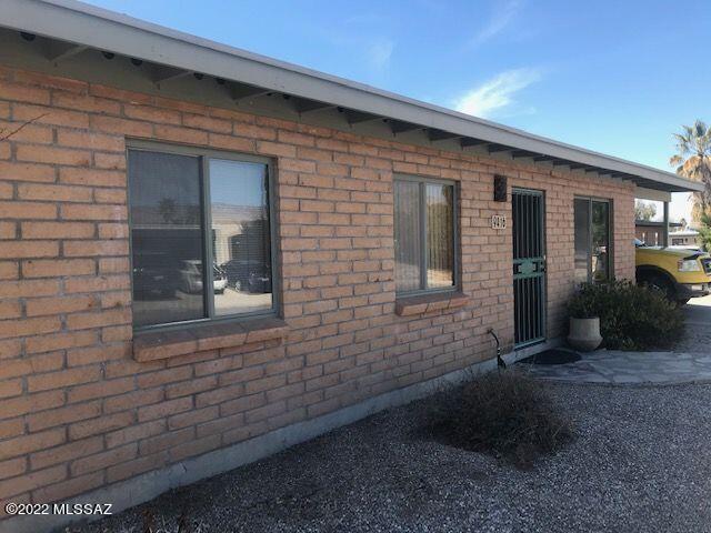 Nice 3-bed 2-bath on a quiet cul-de-sac. Just a minute or two to stores, schools, and the new NW Medical Center opening soon on Houghton. Remodeled kitchen, huge laundry room with sink, dual pane windows, lots of storage, including attached shed, screened back patio, HUGE and very private backyard with 10-ft wide access gate. Mountain views from property, attached carport, all appliances convey.