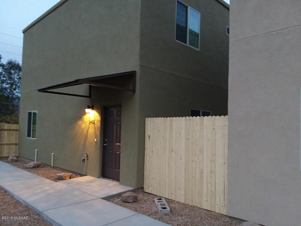 Two beautiful 2-story homes on one lot. Each unit identical, and perfect for investors, or the family minded who want to live close to family without sacrificing privacy. Each unit 1,232 sq. ft., for a total of 2,464 sq. ft., and with 9-foot ceilings. Decorative colored concrete 1st floor, with carpeted upper 2-bedrooms each with a full bathroom, and ceramic title. Gorgeous granite counter tops for both the kitchen and bathrooms, along with all new stainless steel appliances in the kitchen, including refrigerator, range, dishwasher, hood microwave oven, and disposal. Full six-panel style interior doors, and rounded drywall corners throughout. Each unit has been thoughtfully built with energy efficient construction, concrete sidewalks, and low maintenance grounds.