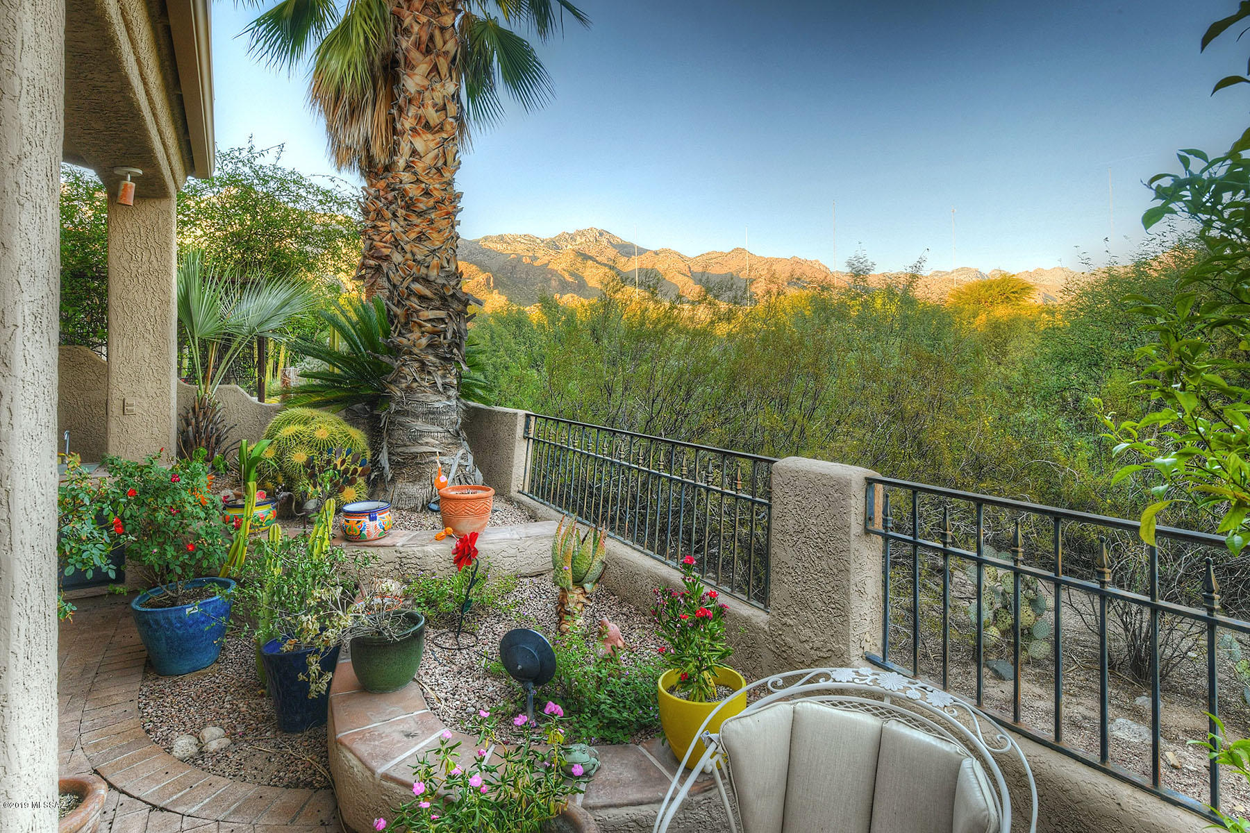 Exceptional Value! Free Standing Golf Villa Located at The End Of Golden Eagle Drive on a Quiet Cul-De-Sac w/Ultra Private East Facing Mountain Views. This Original Owner Villa Offers a Spacious Kitchen w/Gas Cook Top, Breakfast Bar,& Dining Area w/Mountain View Windows all Opening to a Great Room w/Oversized French Doors,Picture Window,Custom Niches For Art/Books,Vaulted Ceilings & Beehive Fireplace.Master BR w/Mountain Views Offers Large Master BA w/Separate Tub & Shower,Double Vanities,Water Closet, & Spacious Walk In Closet.Other Features Include Den/Office,Guest Room w/Hall Bath,Laundry room w/sink, & Brick Paver Back Patio w/Palm Trees,Majestic Mountain Views,Covered Eating Area & Built in BBQ Bar w/Sink. Close to Guest Parking, Beautiful Community Pool & Spa, & the VC Country Club!
