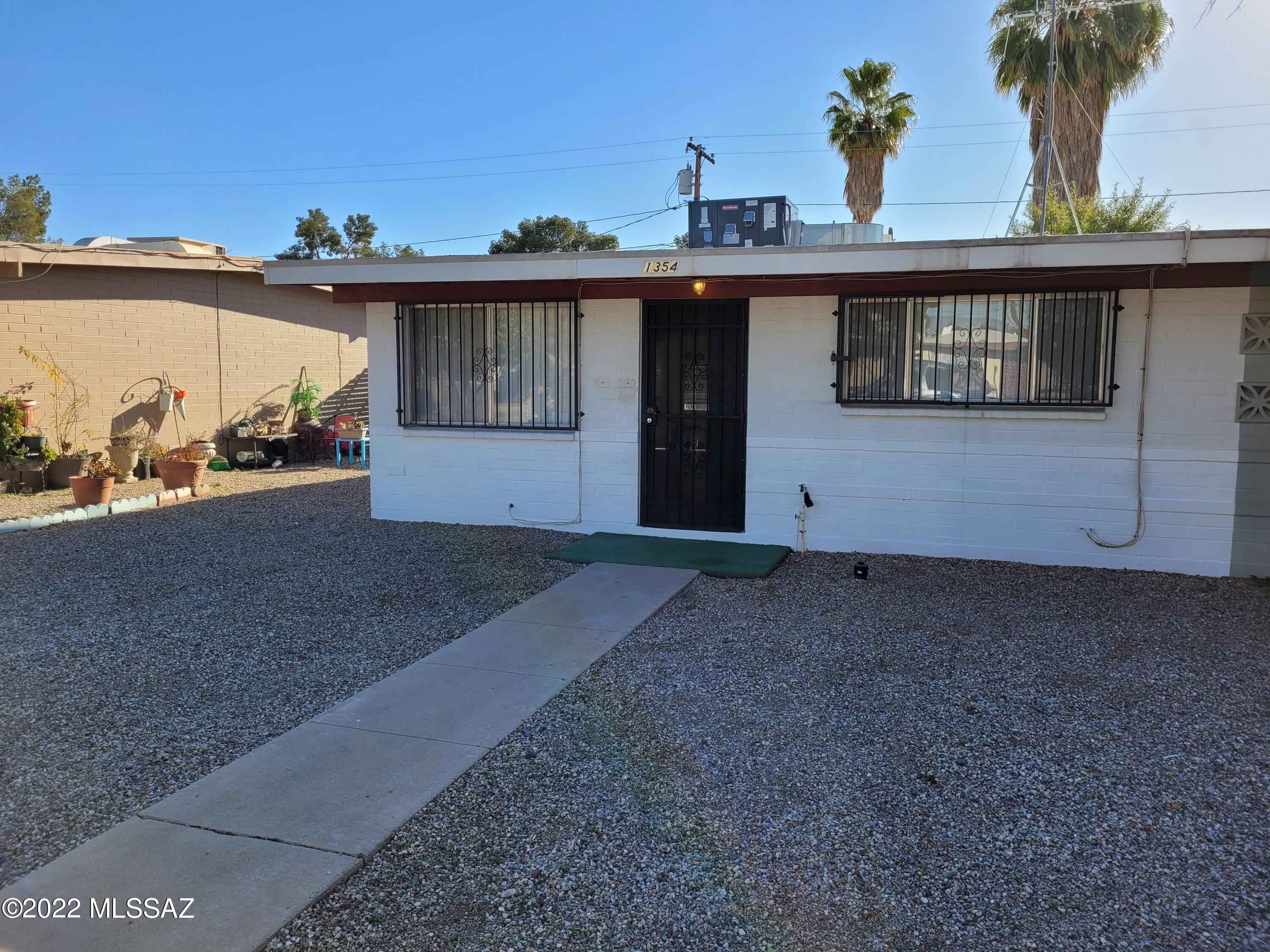 Charming townhouse. End Unit.  New 20-inch tile flooring throughout. Updated kitchen and bath with walk-in shower, New AC gas pack 2020.  Gas Range. New paint. Laundry room and bonus room. Large-fenced yard with rear gated carport. New elastomeric roof coating. Low HOA fees.
Owner/Agent.