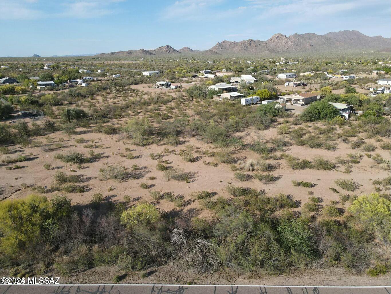 Beautiful 2.2 acre flat buildable lot. Off paved road, power is at lot line, septic needed and water is offered by private water company. Short drive to downtown Tucson.