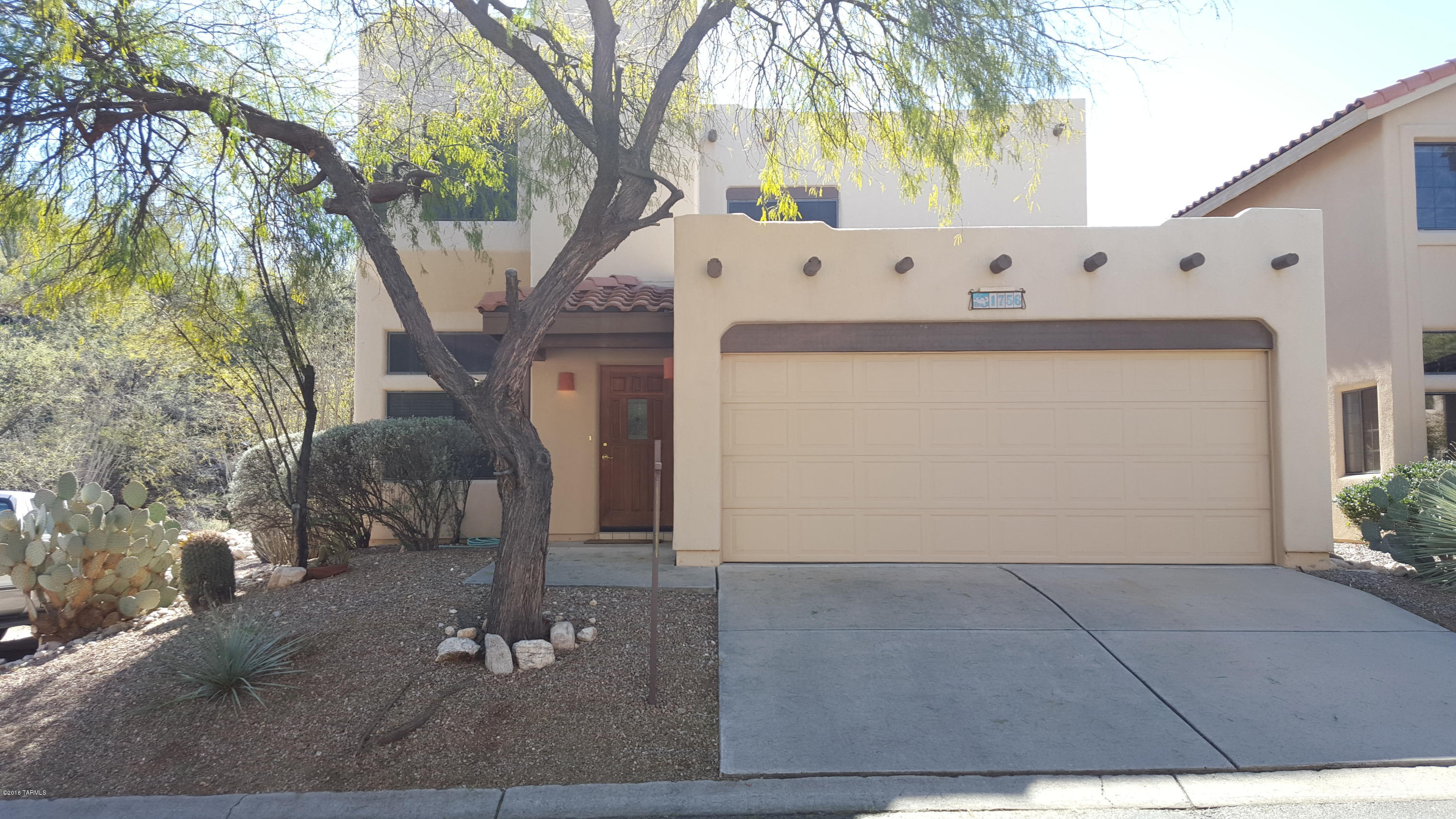 This Newer Santa Fe style 2 story home is located in an exclusive gated community and backs up to natural preserve. The home features 3 bedrooms, 2.5 bathrooms, a loft, formal living area, 2 fireplaces, large covered patio, balcony, private yard and two car garage.