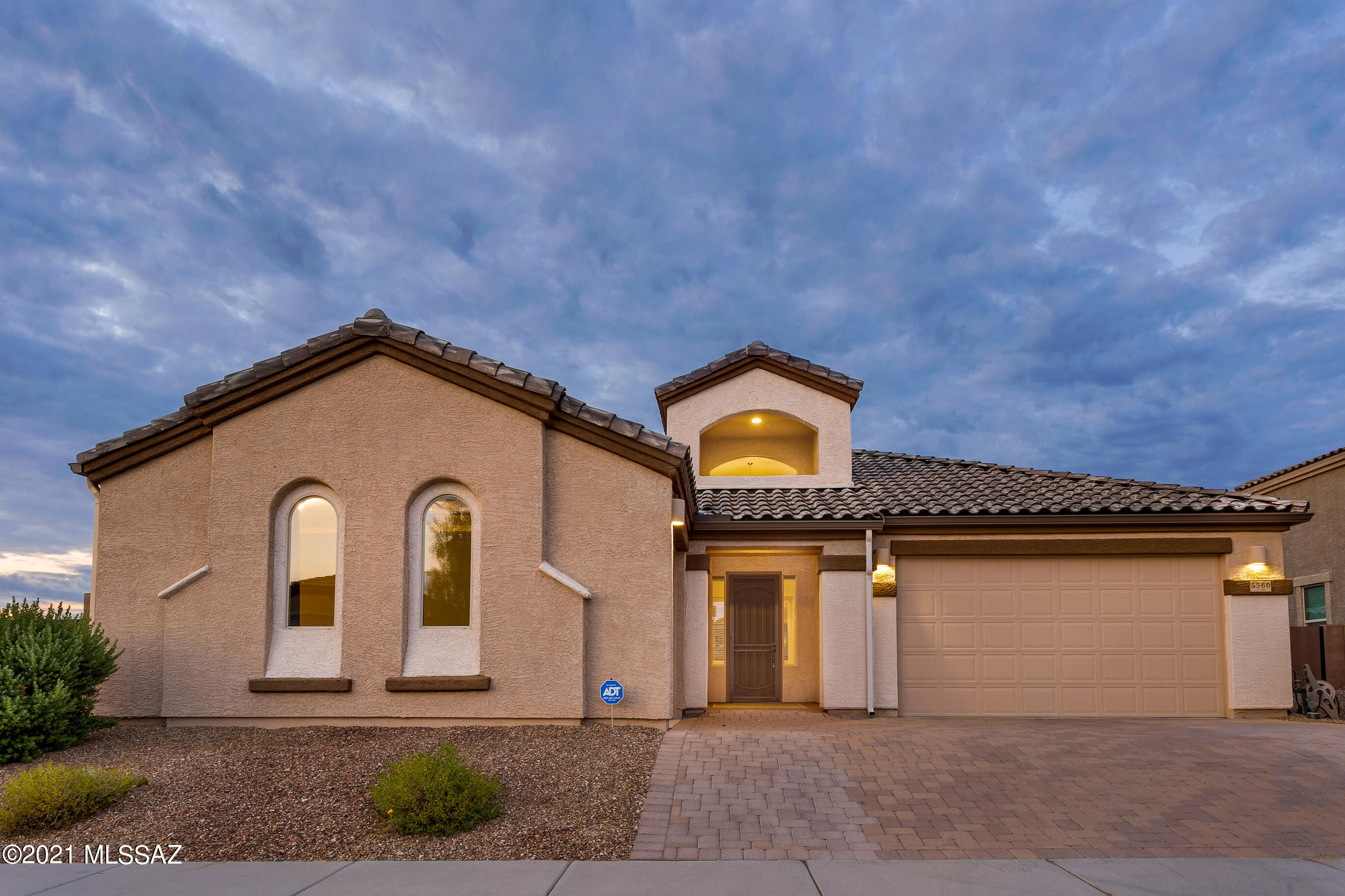 Why wait for construction when this like new 2016 resale can be yours! Located on a large cul-de-sac lot this 4 bedroom, 3 bath home is ready for new owners. Upgraded throughout with ceramic plank flooring, huge kitchen w/granite counters and eating bar, great room with separate dining area. Enjoy your owner suite with custom tiled walk-in shower, separate tub, dual sinks & walk-in closet. Office by the owner suite for those work from home days. Brand new carpet in bedrooms and office. A separate 3rd car garage is set up for a gym, bar, car, etc. Paved driveway and back patio. Yard has built in grill station and is ready for a pool with plans and approved permit. Close to I-10 and shopping plus enjoy the mountain views coming, going and from the backyard.