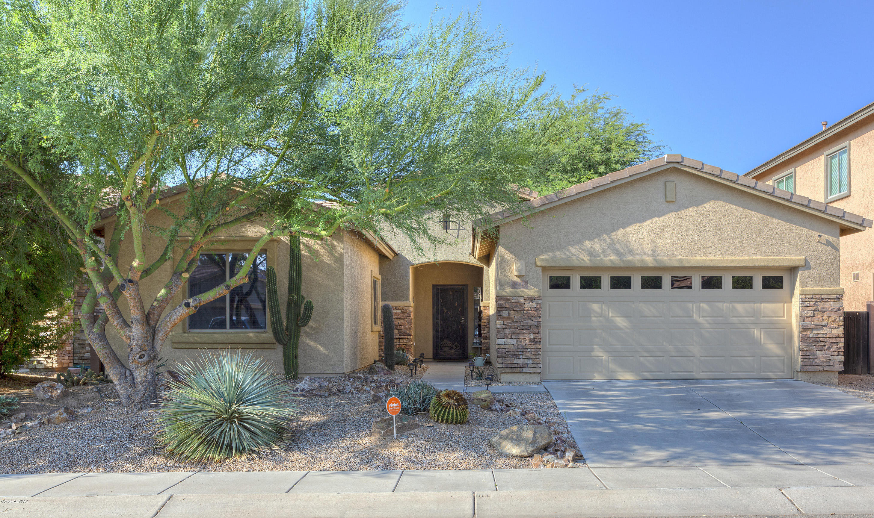Welcome Home to this single story, 4 bedroom, 2 bath, 2135 Sq foot home in the highly desired Madera Highlands Community. This open concept floor plan has been freshly painted both inside and out and boasts recently installed wood-look porcelain tile floors. Your kitchen is complete with granite countertops, pendant lighting and new stainless steel appliances. Let's not forget about your 3 car garage that includes built-in cabinets to store all of your holiday decor. Your backyard is fully landscaped with pavers, artificial grass and decorative gravel. It'll be the perfect place to spend your evenings grilling (natural gas hook up available) or entertaining friends around the fire pit. **Home Warranty Included** This is a must see!