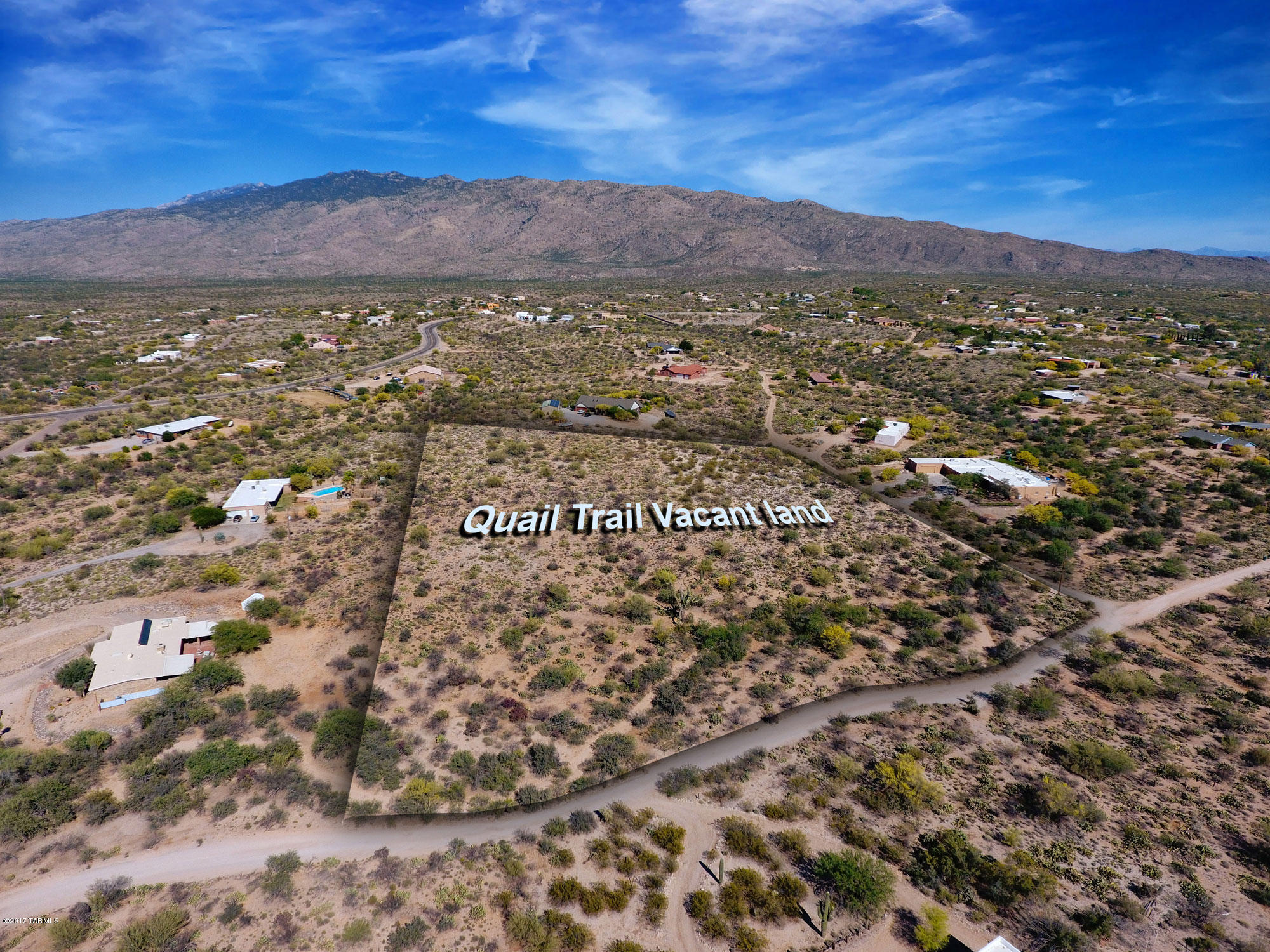 BRAND NEW ACCESS FROM QUAIL TRAIL! Lushly vegetated 4 +/- acre lot offers wonderful Catalina and Rincon Mountain views. Slightly sloping terrain makes it easy to build.  Great eastside location. Hiking, Biking, and Horse Enthusiasts will love the close proximity to Saguaro National Park East! Tanque Verde Schools!  See attached documents for copy of Aerial Map, Survey Map, Topo Map, SPDS, AOD, CCR's and Utility info. Aerial map shows the potential building site for Parcel B (note new access). Lot has been surveyed and staked. Tucson water, electric and gas are available. Please use Eleanor Ortega with Long Title/Title Security as Title Commitment has been received. Lot has already been split and new tax code has been assigned. Waiting for new tax bill.