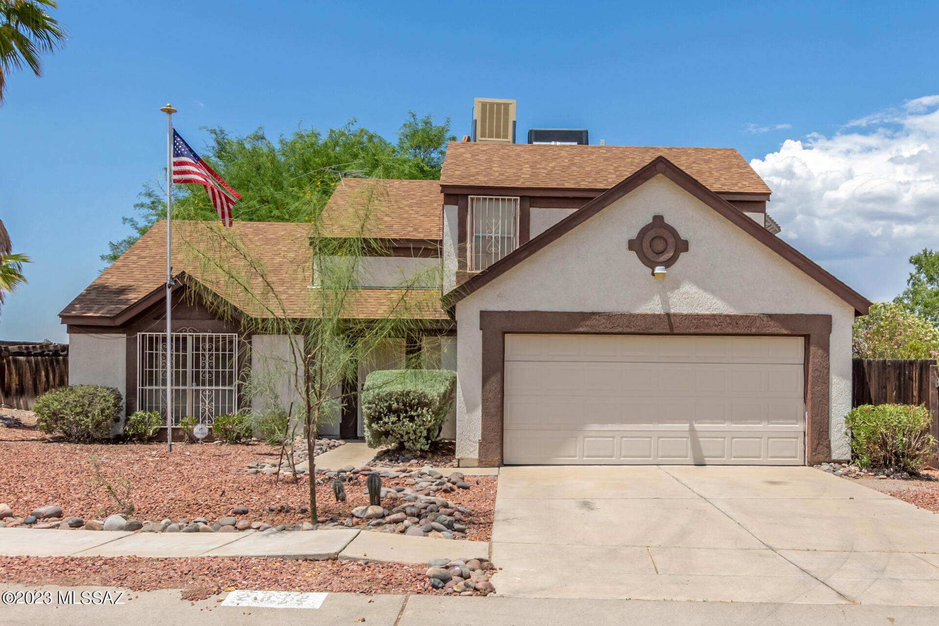 Welcome to this wonderful two-story home that offers a perfect blend of comfort and functionality! Displaying a desert front yard, RV gate, and a 2-car garage. Inviting interior boasts a formal living & dining room, tile flooring downstairs, neutral palette, tons of natural light, and vaulted ceilings. The heart of this gem is the large family room that seamlessly flows into the kitchen! Ample wood cabinets, a pantry, and a cozy nook w/bay window complete the kitchen. Main bedroom is downstairs, featuring a walk-in closet and a private bathroom w/dual sinks. Head upstairs to find the secondary bathroom & bedrooms with plush carpet. Enjoy relaxing in the serene backyard with an open patio, pergola, storage shed, & shade trees! Don't miss this excellent opportunity!