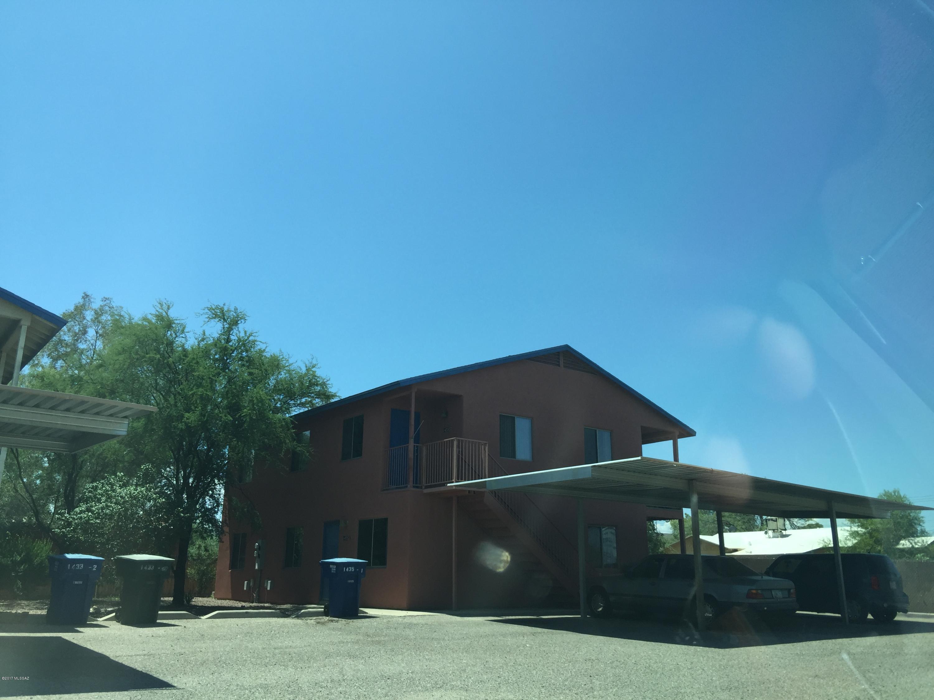 1435 N Sycamore Blvd #1 Tucson AZ 3 bedroom 2 bath unit built in 2002. private washer & dryer hook ups, 2 covered parking spaces, Large rooms and A/C. No pets. Downstairs unit. Built in 2002. Carpet  only in the bedrooms.