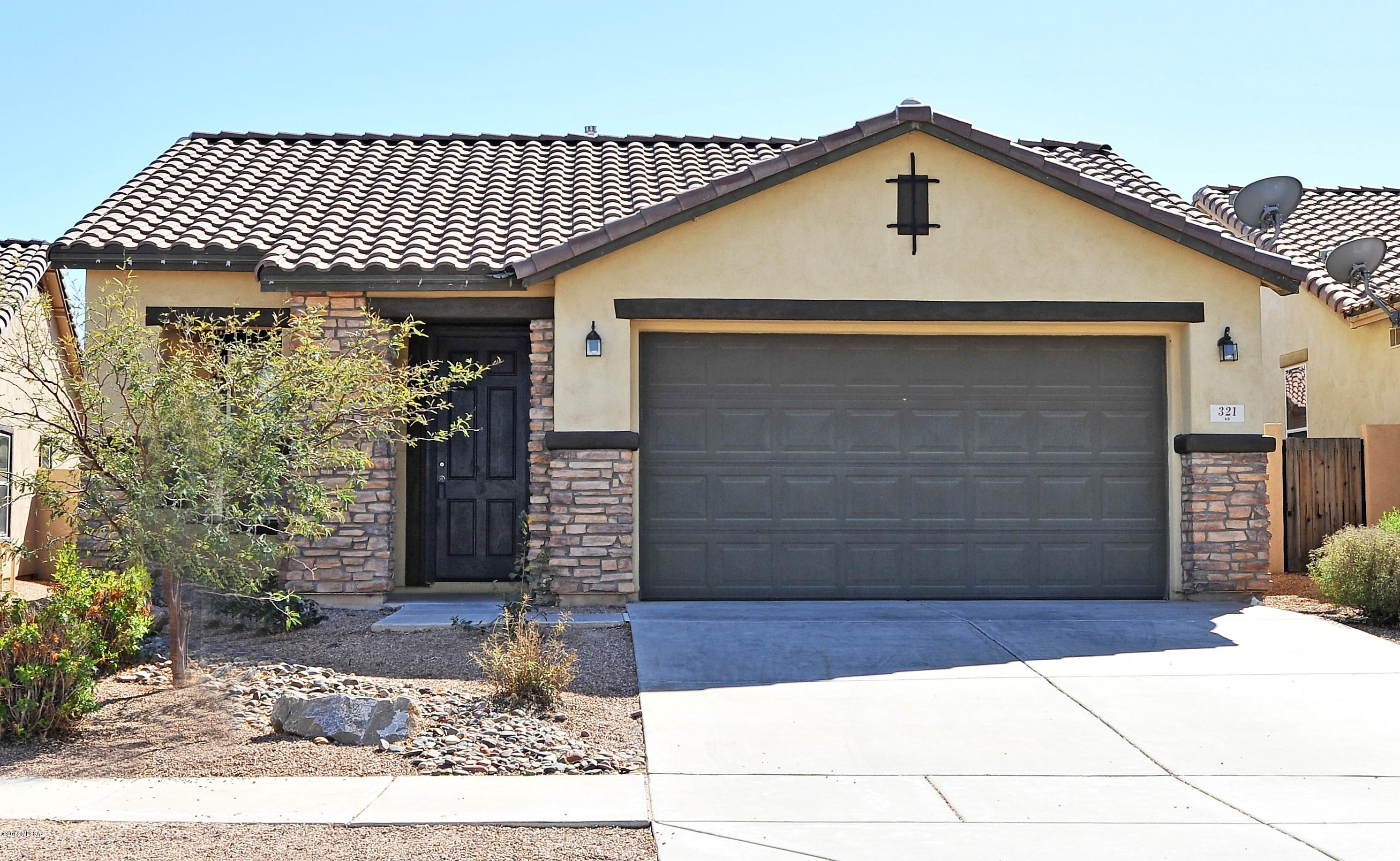 Great location and great price.
Stone veneer on front of home
Open kitchen to the family room
Lots of cabinetry, gas stove and breakfast bar with seating for 4 and a pantry.  Master bathroom has dual sinks, garden tub/shower with sliding glass door Window coverings throughout
Laundry room with gas or electric hookup and overhead shelf. Front covered porch Tiled Roof,Dual pane windows. Good sized yard with block wall and extended covered patio. This home is very clean and move in ready.