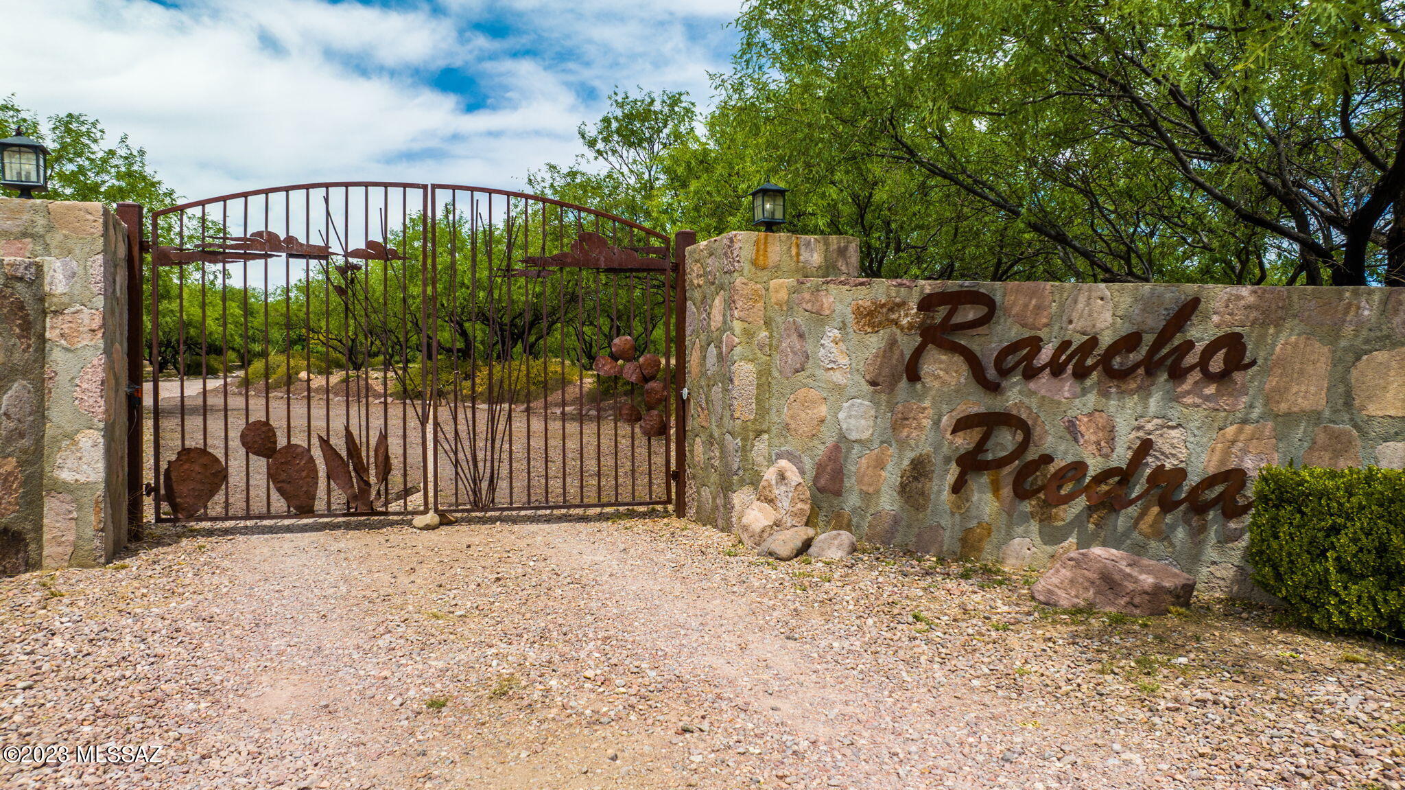 Wide open spaces await at Rancho Piedra, a sprawling equestrian estate featuring a refreshing private pool and situated on more than 12 acres, with two additional 8-acre parcels available for optional expansion. Here you'll find the main home, a detached garage with bathroom and kitchen, plus a casita and an additional studio, making this an ideal setting for hosting visitors. Horse facilities allow you and your guests the luxury of horseback riding in your own expansive backyard. Outdoor living and entertaining spaces feature a tree-shaded walled courtyard with glistening pool, open terraces, pergola-covered terrace, and a fireplace pavilion. Interior features include tile flooring, exposed beam ceilings, fireplaces, wine room and more. Private well