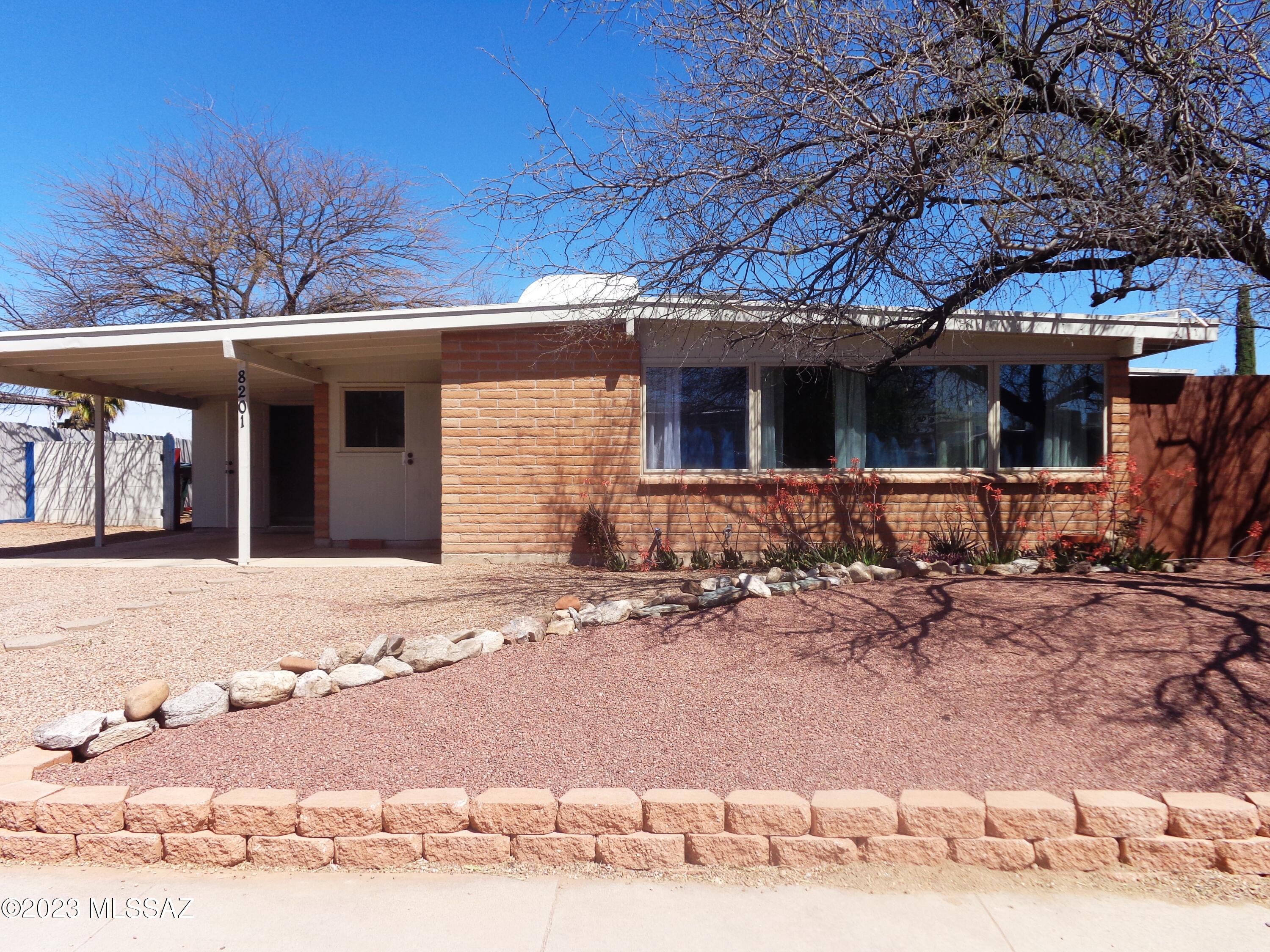 Beautiful 4 bedroom home in the popular Lakeside neighborhood! Close to Amazon, Raytheon, I-10, Davis Monthan AFB and the Sonoran Science Academy. Located between Lakeside Park and Lincoln Park-both just a few blocks away. Remodeled to perfection in 2021, the home is turn-key and ready for new owners. Granite counters, cool A/C, ceiling fans, wood-look ceramic tile throughout, large lot, mountain views, huge shed, all appliances convey, and.... NO HOA!