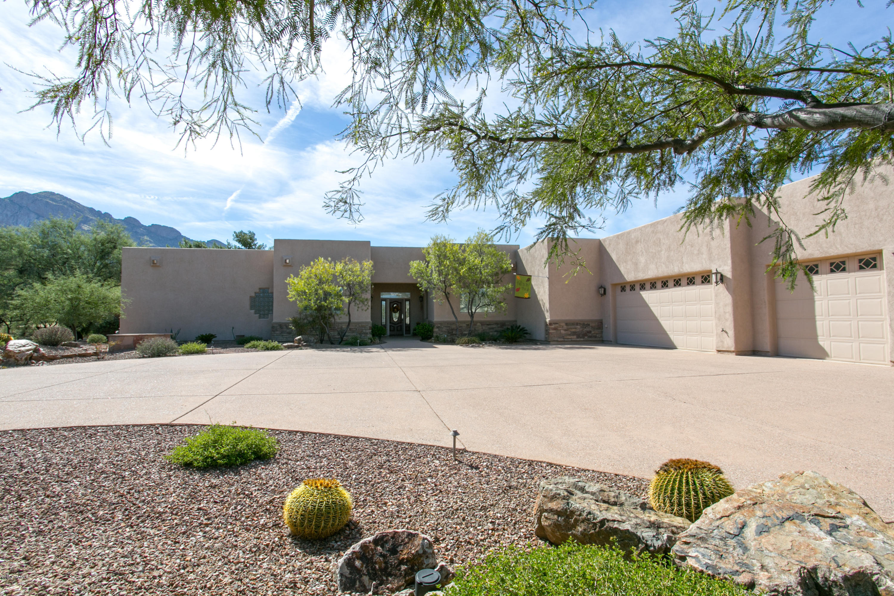 Custom 2005 built home on .83 acre premium golf course lot in 3RD Fairway at Oro Valley Country Club. 3841 s.f. home having 4BR/4BA (one BR is Guest Quarters), and a Den. Great Kitchen for your chef. Super floorplan. 3rd Bedroom has Murphy Bed and matching Desk Counters. Two Dual 2/4 ton A/C units. Ceiling fans throughout. 4-car insulated garage with built-in cabinets, double ventilation (thermostat controlled exhaust) and workshop. Slim Line Master Cool on garage. Covered patio, pergolas, and gas BBQ Island with sink and refrigerator. Great luxury home for country club lifestyle. Oro Valley Country Club membership is available.