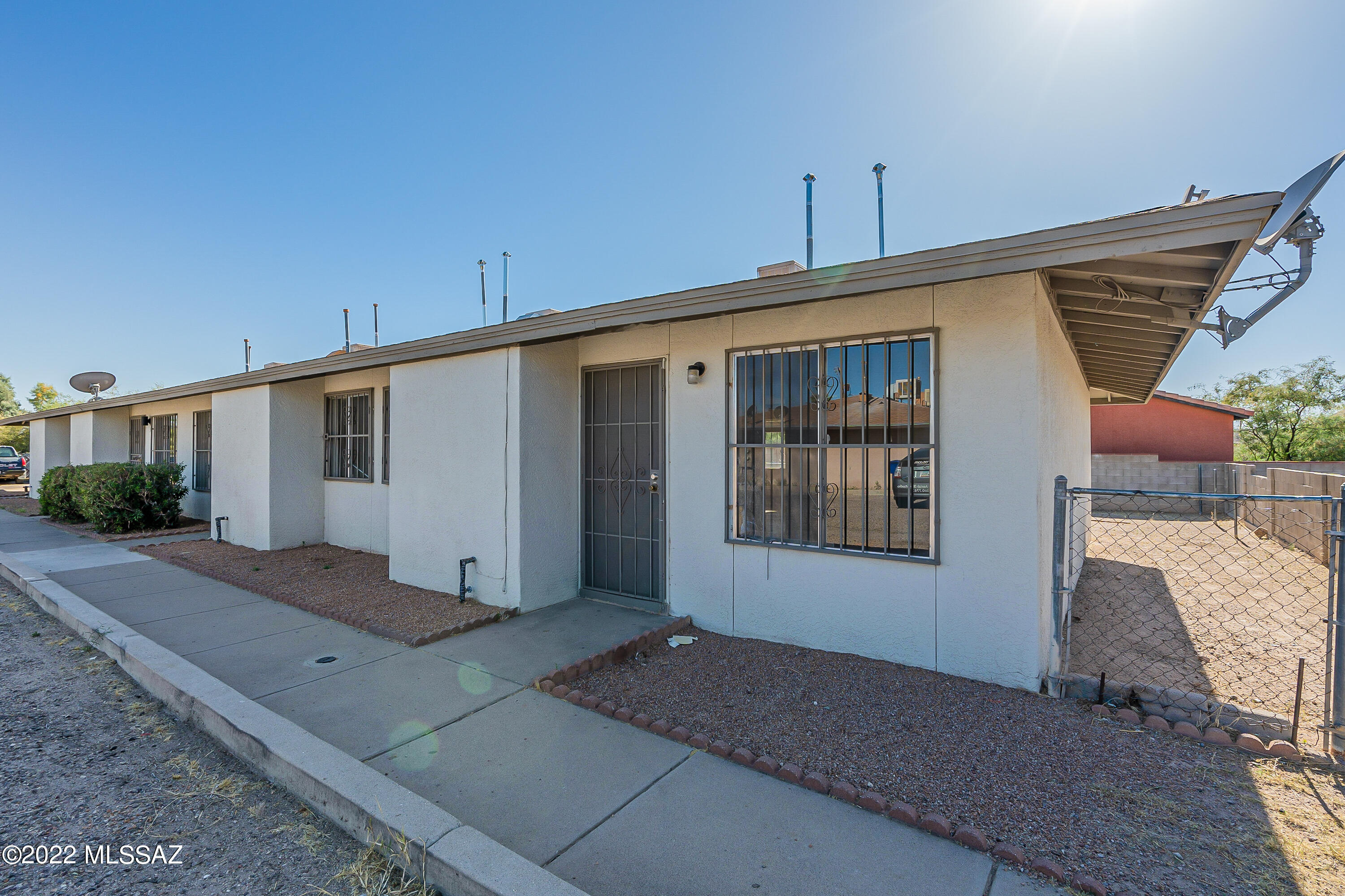 4-PLEXS ARE RARE TO COME BY! Make sure you don't miss out on this generous sized 4-plex. Each unit features 2 full bedrooms, one bathroom, washer/dryer, large kitchens, and ample living space. Don't forget each unit also has individual yard space, fully fenced! Newly painted exterior, painted cabinets/countertops, many more upgrades. This property is only 8 miles from Downtown Tucson, and 11 miles from University of Arizona. This is a great investment property, market rents show $950/mo+ per unit. With a little more bedazzle, could easily bring in more! Unit #4 is fully rented, while units 1-3 are ready for management. Each unit is individually metered for electric, one bill for water. Come view today!
