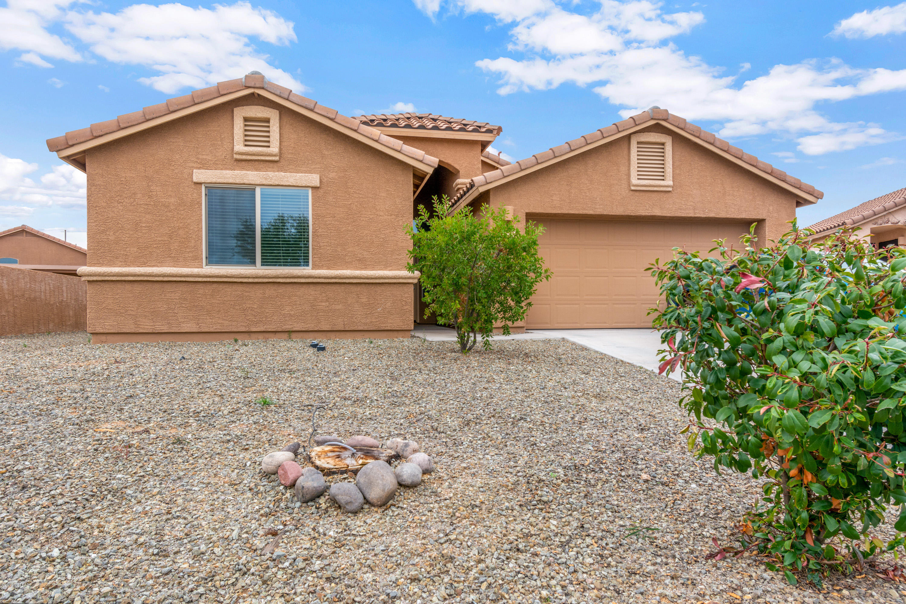 As you arrive at this home, located in one of the few cul-de-Sac in prestige's Desert Creek, The cascading archway directs you to the front verada. This  rare 3 bedroom, 2 bath comes fully furnished. The architectural interior design includes plant shelves and more. Extra large garage.
