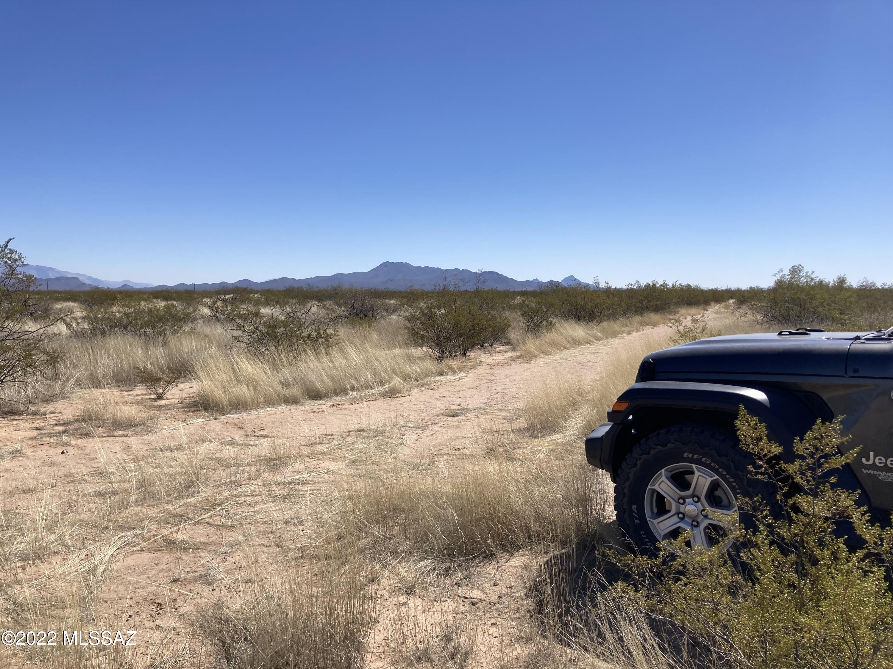 Clean 5+ acres - original desert brush - perfect for new home or whatever your needs