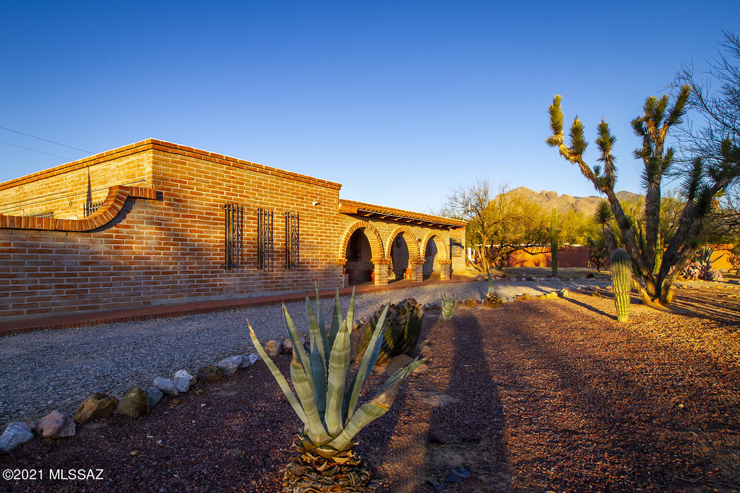 Beautiful, well-maintained burnt adobe home with Mt. views, spacious 1.6 acre horse property in desirable Mesaland with its own water company. 3 large bdrms, 2 baths. New heat pump w/AC 2017. Spacious great room w/fireplace,dining area & breakfast bar; New 2016 SS refrig, dishw, range, hood, sink at window, front load washer & dryer; Large living flex space. Security doors & windows. Laundry room off kitchen w/custom cabinets & shelves, indoor-outdoor kennels,large wash tub. Covered patio; pool, spa & shaded area. Great location, easy access to The Loop to bike, walk & run; hospitals; Pima College, Public, Charter & Private schools; YMCA, Churches, Public Library, Tohono Chul Park, Golf, theaters, restaurants, shopping & more. This is a beautiful home on a gorgeous stretch of Sage Street.