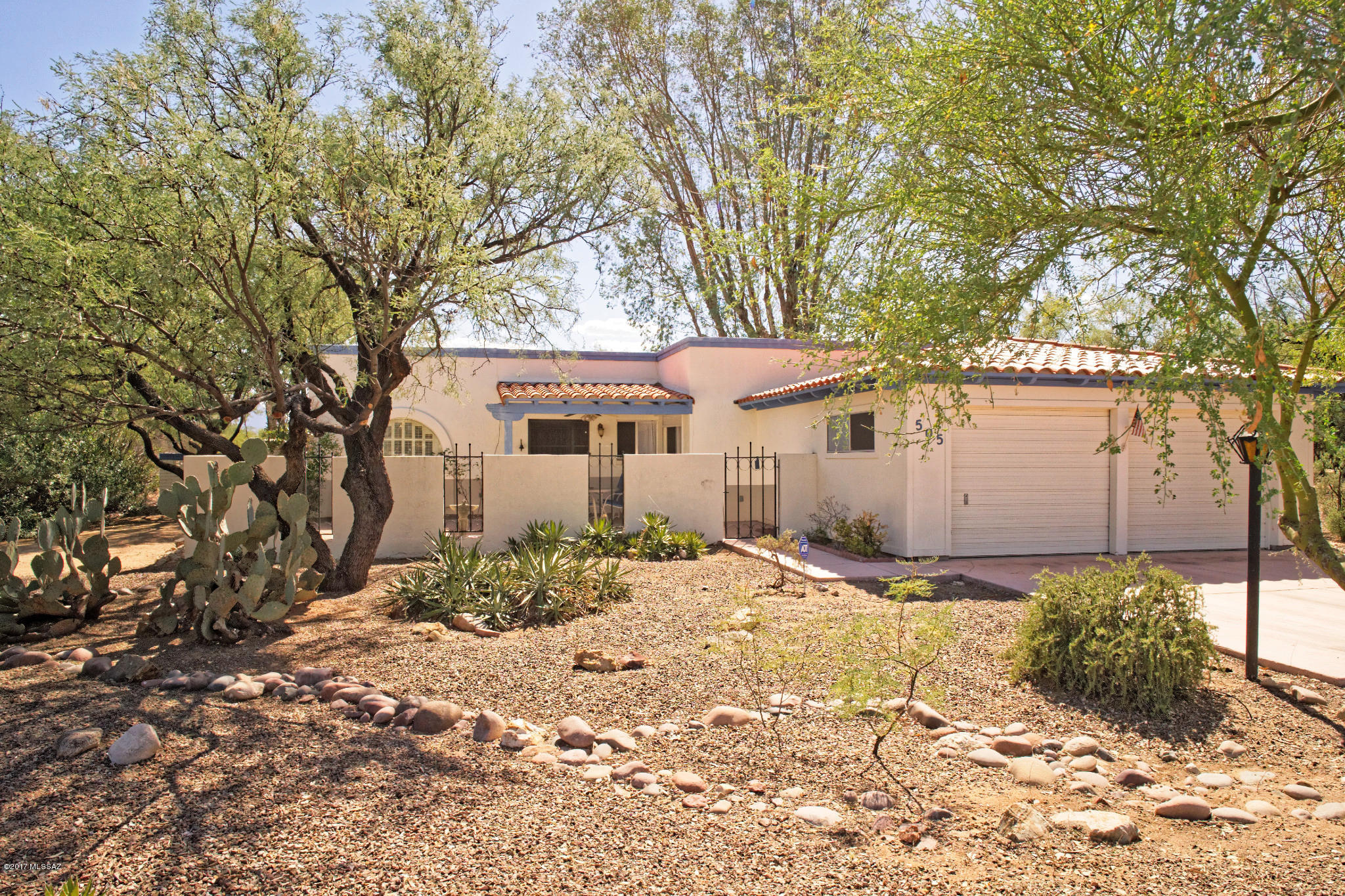 BACK-UP OFFERS WELCOME  No HOA or age restriction on over 1 acre in Green Valley? Here it is. This 2 bedroom, 2 bath one story home with over 1900 s.f. sits on over 1 acre. Easy care flooring-no carpet! Large great room with gas fireplace. Formal dining area plus eat-in kitchen. 2 car garage with workshop, office or hobby area. Enjoy the front courtyard or large rear patio while enjoying the Santa Rita Mountain view. AHS Home protection plan included. Green Valley Recreation membership & fees apply. Being sold ''AS IS''. Please excuse the dust. The seller is having some outside work done on the house starting approximately December 1st. Thank you for your patience.