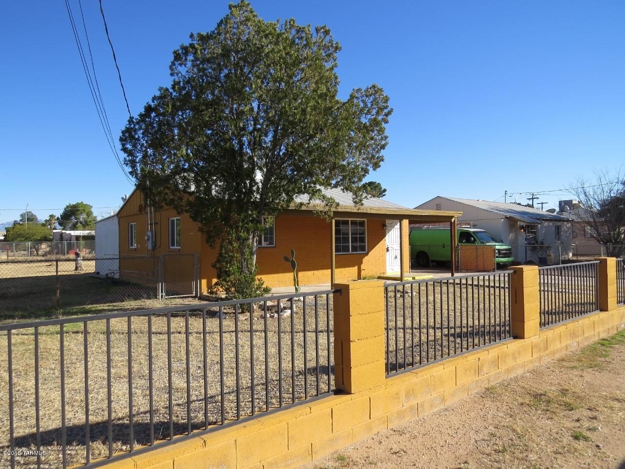 Fabulous opportunity in Central Tucson.  New Trane AC, new duo-pane windows and new roof in 2007!  Large fenced yard with covered patios and privacy.  Solid home with good HVAC efficiency, just needs cosmetic painting and touch up.  Close to bus routes and shopping and dining.  Perfect starter or retirement home!  Come and see.