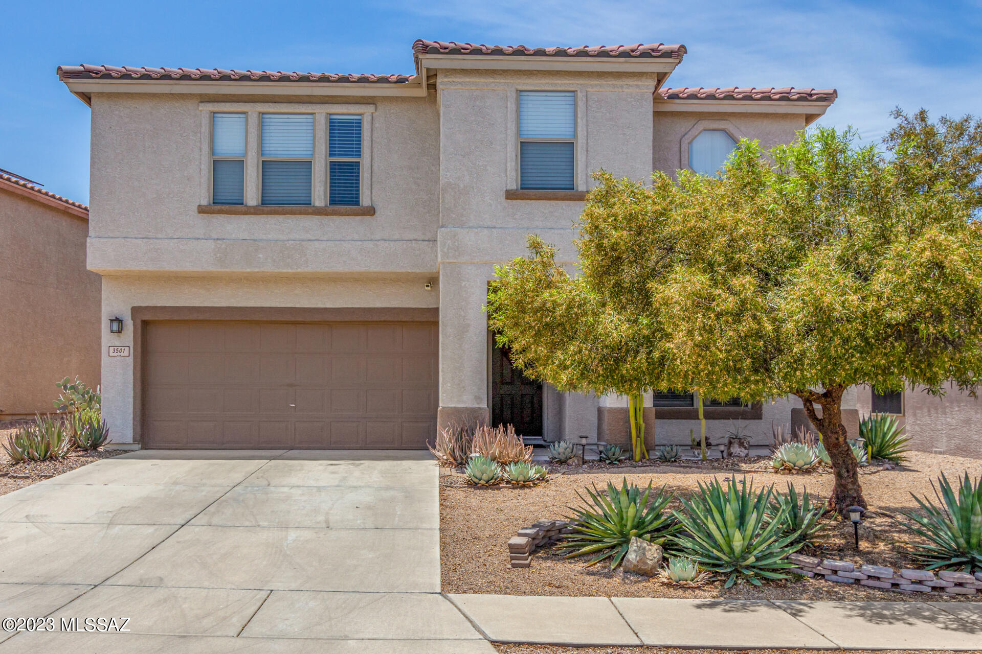 Experience the comfort of this amazing 4-bedroom home in this Gated Sweetwater Reserve community.The interior features spacious living areas with tile flooring and a calming color scheme. The kitchen is equipped with stainless steel appliances, stylish mosaic backsplash, wood cabinetry, track lighting, and a center island with a breakfast bar. The versatile loft can be used as an entertainment area or game room. The primary bedroom offers an ensuite bathroom with dual sinks, and a walk-in closet. The backyard is a private oasis with fruit trees and a covered patio, built-in BBQ, fireplace, and hot tub, perfect for relaxation. Don't miss out on this must-see property!