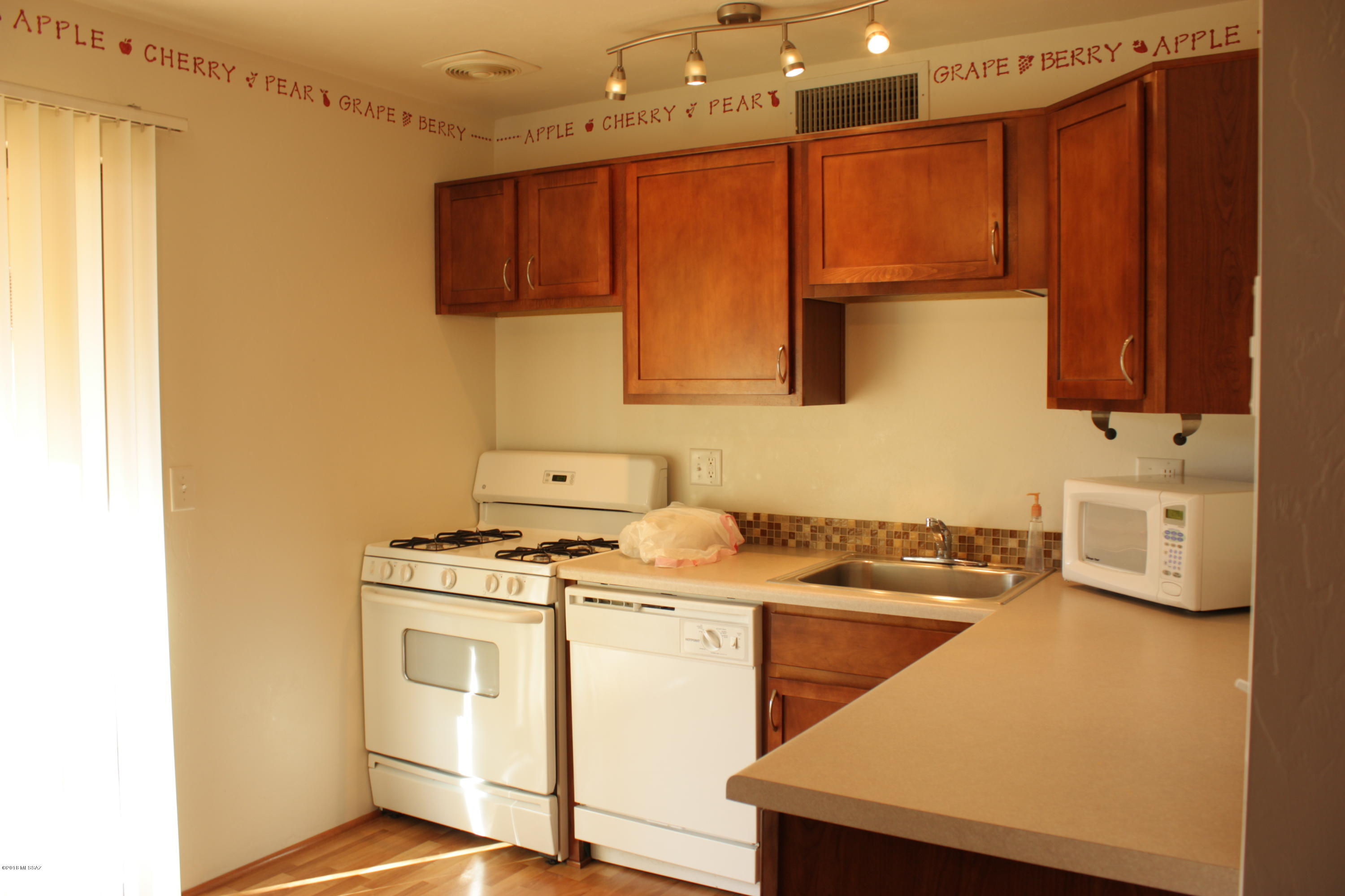 Sunset Foothills Condos (1-201) - Residential Lease