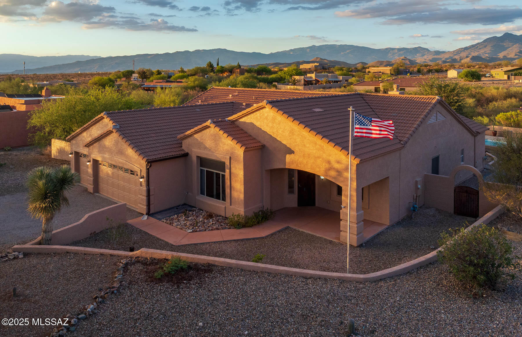 Sellers will accept or counter offers between $600,000 and $610,000. Lovely 4-Bdr/2.5 bath home in gated community located in Vail School District. VA Assumable loan 2.3% interest rate. Must have VA eligibility.  Split-bedroom spacious floor plan features living room, dining room with rough-sawn wood accent wall, open kitchen with island and barstool seating, breakfast nook, and family room with fireplace.  Primary suite has large walk-in closet, garden tub, and separate shower. Step out into the gorgeous backyard oasis with covered patio, pavers, pool with solar heating, gazebo, and beautiful landscaping. Backyard also features wide double gate access, pad for a shed, and 2750-gallon water reclamation tank. Exterior just painted. Space for RV.