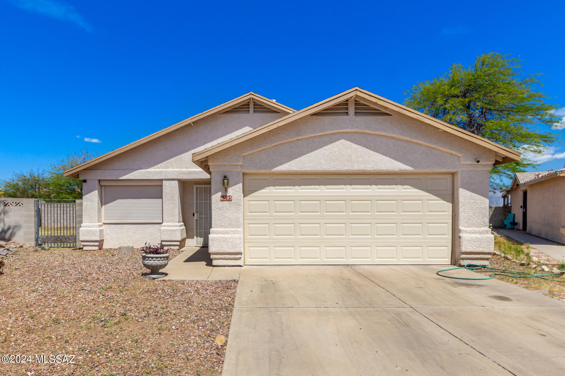 Looking for a beautiful 3 bedroom home with 2 living spaces on a large lot?  This home may be for you!  As soon as you walk in you will enjoy the vaulted ceilings, and tile floor that is throughout the entire home!  The backyard offers a ton of space and is ready for your personal touches.  Roof, HVAC, and water heater are all newer as well.  Come by and check this out soon.  Don't miss your opportunity to get into a home for under $300k!