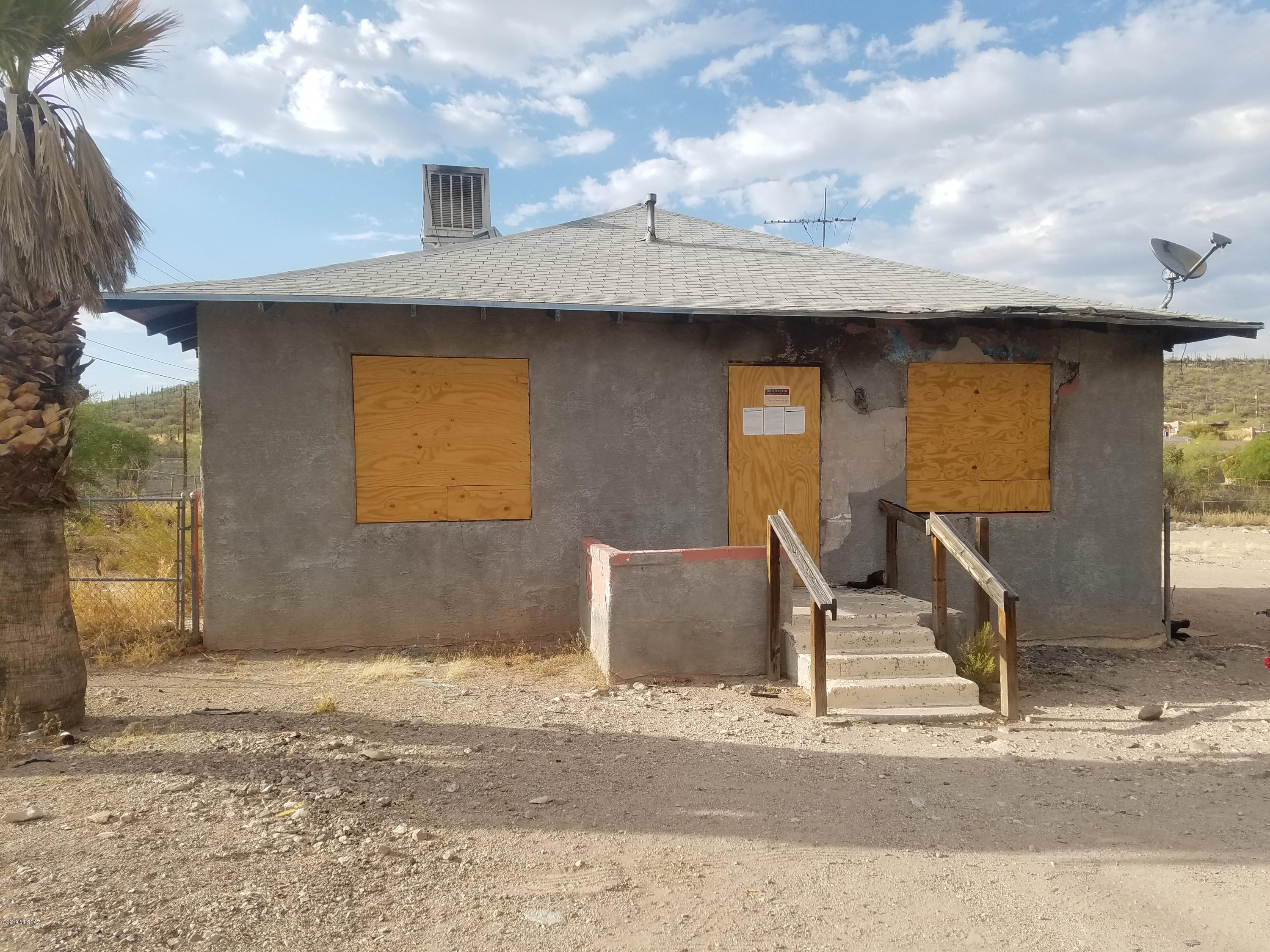 Great investment property.  Home has fire damage so buyer will want to research property and check any local restrictions.