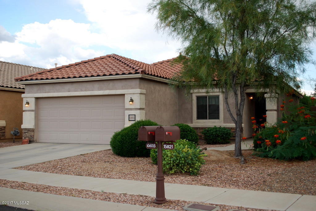 Gated Rancho Sahuarita 55+ Community Home. 2 Bed 2 Baths + Den,  1594 SQ FT on a view lot and part of the Gated Rancho Resort Community. Spacious great room floor plan. Tile floors in all living areas, carpet in bedrooms. Eat in Kitchen looks into living area and has maple cabinets and island. Master Suite has dual closets, dual sink vanity and walk in shower. Ceiling fans in all rooms. Full size washer/dryer. Extra long garage comes with storage and workbench. Community comes with pool and spa, tennis courts, bocce courts and clubhouse. This home is offered as NON-SMOKING. Tenants must be 55+ as per community age restrictions. Pets subject to owner approval.