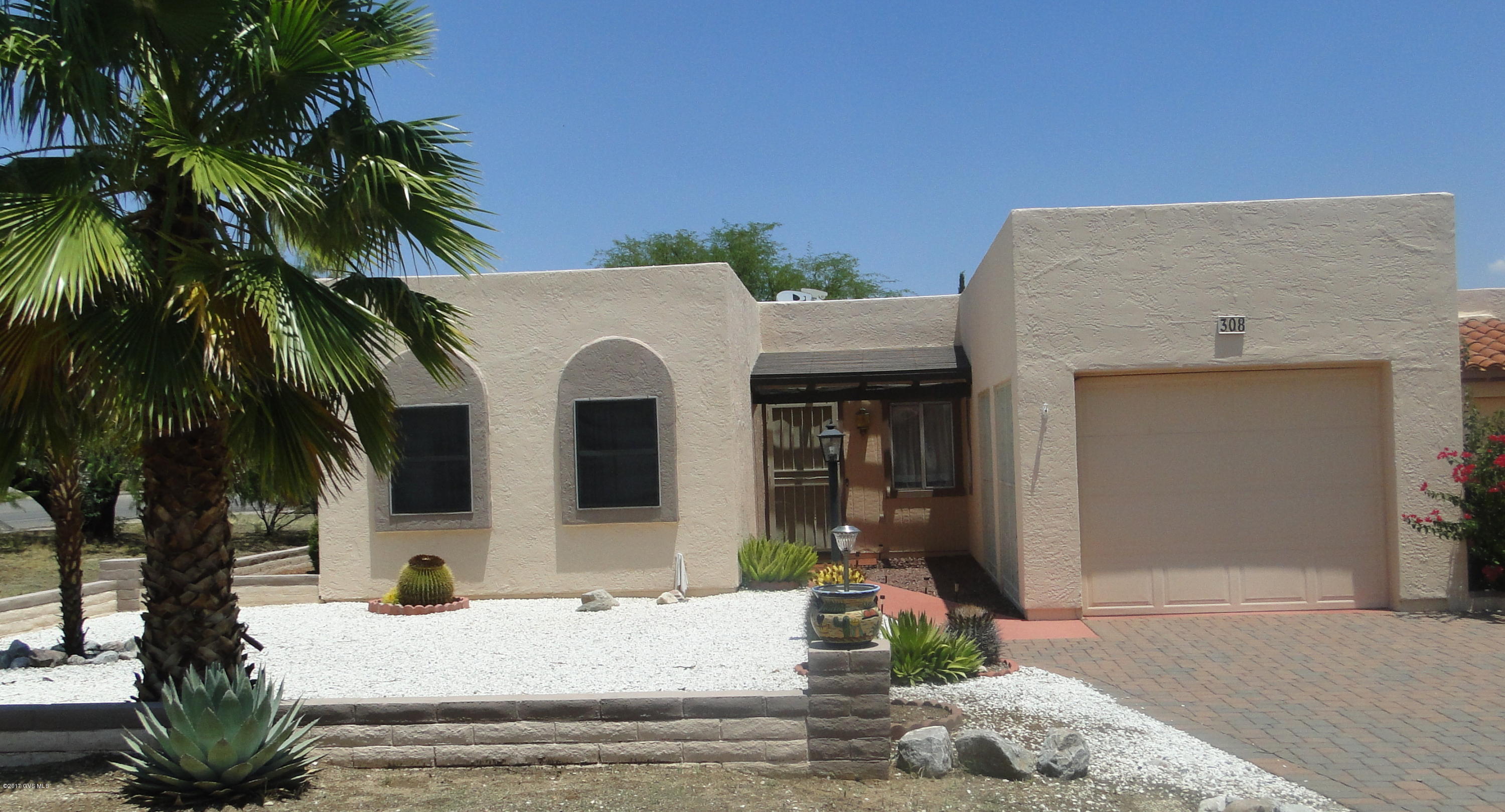 Great townhome in Country Club North, lots of common ground surround this townhome. 2 bed 2 bath with AZ room. Well cared for home with newer carpet and laminate floors. Move in ready.