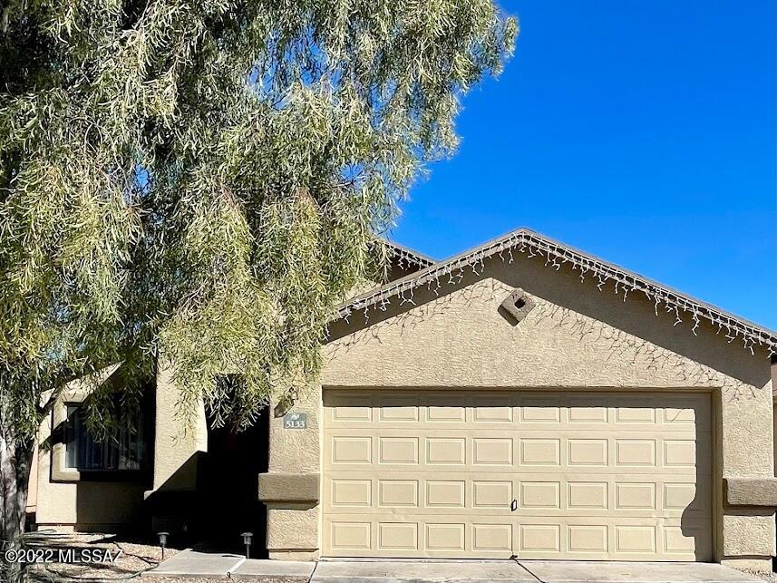 This beautiful 3 bedroom home has a 2 car garage, vaulted ceilings, lush new carpeting, and tile throughout the house. An extra bedroom can be easily converted to flex space, think home office, or yoga studio. The kitchen has plenty of counter and cabinet space while the floating island provides extra prep space. Enjoy evenings in your private walled backyard with a covered patio. This backyard is xeriscape with decorative gravel ensuring low water bills year-round! If you're a gardener this is the perfect blank canvas for you to design as you wish. This home has so much potential you won't want to miss it. Schedule a viewing today.