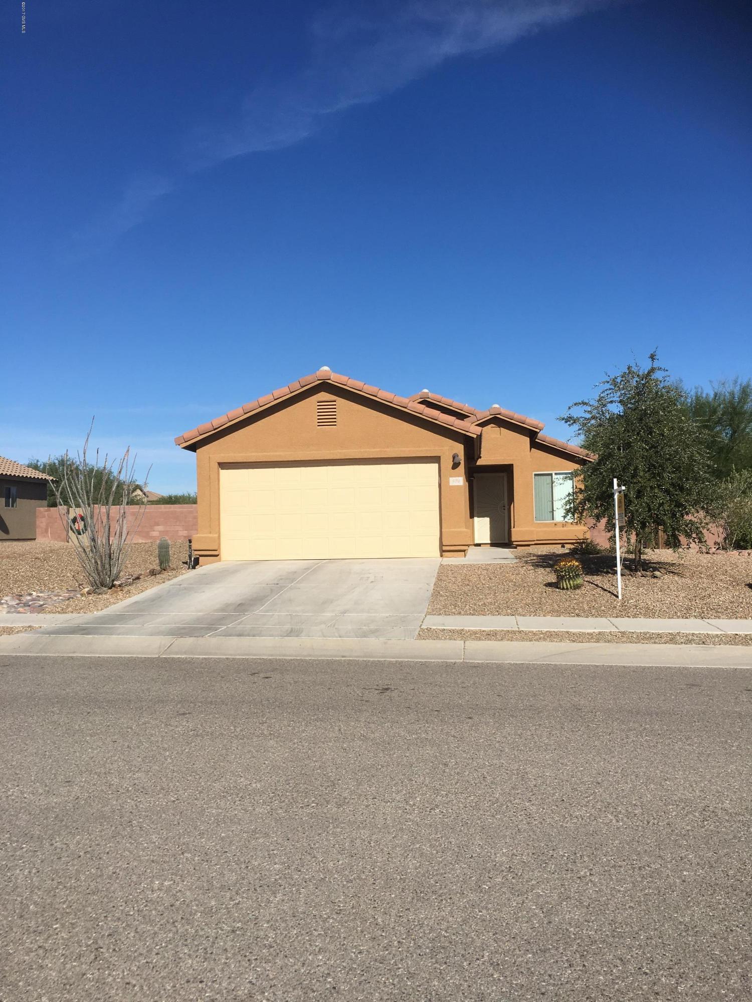 Nicely maintained home on large lot with no rear neighbors. This home offers many upgrades including updated lighting, stainless steel appliances, and tile throughout with the exception of the bedrooms. New carpet has been installed in 2 bedrooms. The master bedroom offers a full wall of closet space and a private master bath. The laundry room has space for extra storage and comes with the washer and dryer. Step outside to a private oversized yard with endless possibilities. This home is turn key, don't miss this opportunity!