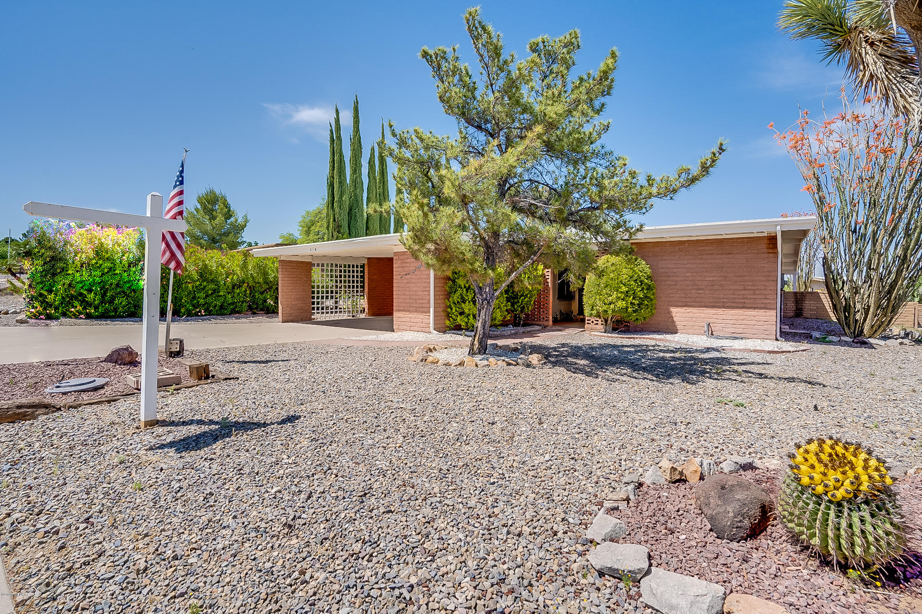 NO GVR! Feast your eyes on this elegantly remodeled Late 70s model Block Ranch home. This has been remodeled head to toe with some of the most modern design schemes to date. NEW ceramic plank tile flooring, NEW Carpet, FRESH paint,  Modern kitchen layout,  Open Floor Plan unlike anything you will find in the neighborhood. Whether a second home, vacation home or your full time residence, this will be sure to set you at ease and fill your mind with peace with a low cost of ownership due to all of the upgrades. Seal up tight in this SOLID Block masonry construction. This is move in ready. Please come look.   All Measures will be taken. Please see seller Upgrade/Improvements.  No GVR but can be if you want it.  More HOA info at villagesofgreenvalley.org