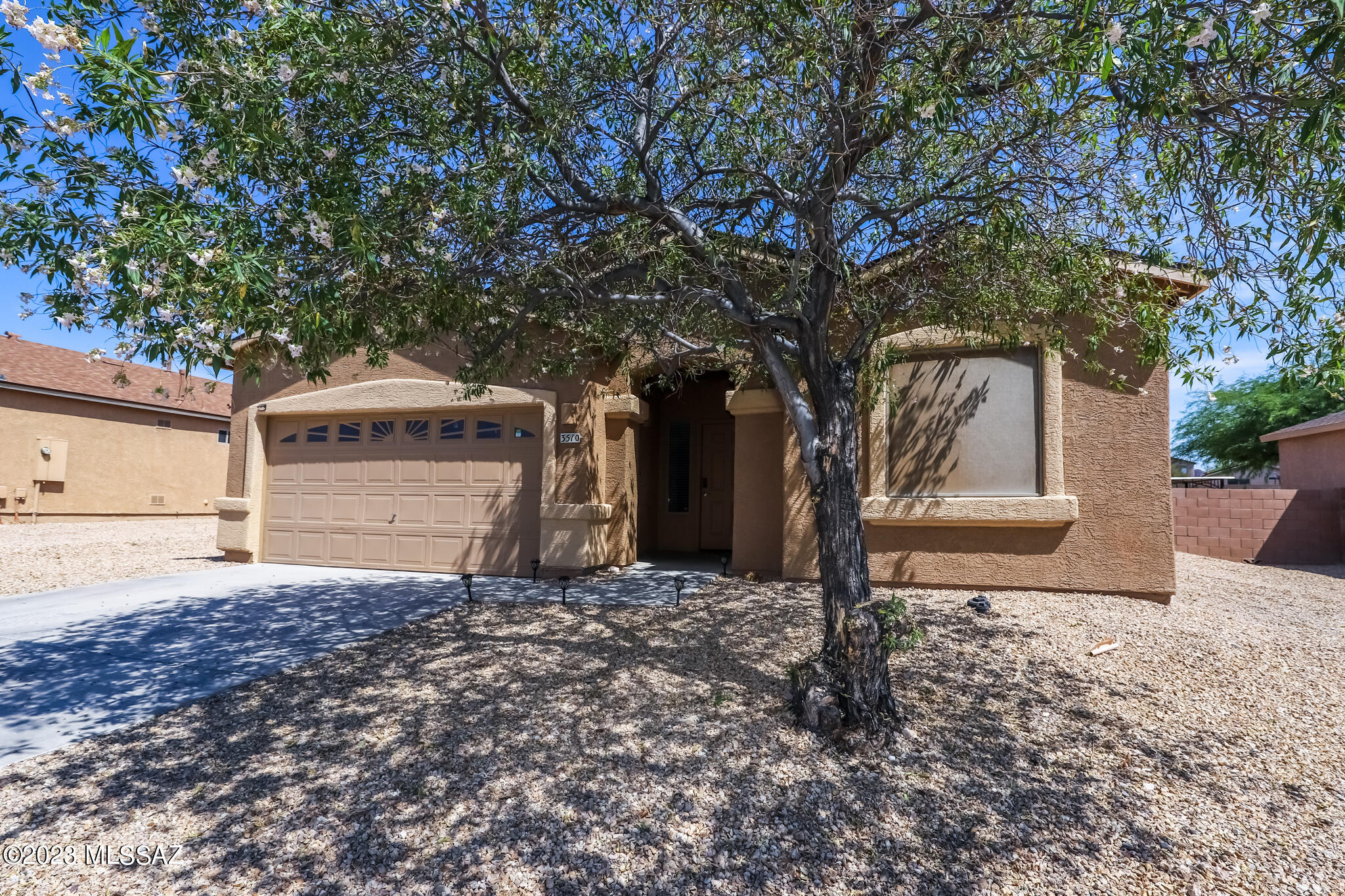 Home Sweet Home. Beautifully well maintained, beyond move-in ready. The Reszi home has a brand new roof with 30yr-rated shingles, new exterior, and interior paint, all ceramic tile flooring, a high 9 ft ceiling, has a kitchen that opens to the living and dining area for a very spacious feel. All appliances stay, including the washer and dryer in the Laundry room with window and storage. Has a split bedroom plan, a master bedroom with two closets, a walk-in shower, a newer water heater, and a garage door opener system. The property is in a great location, with no one behind sunset and mountain views. It also has a common area with a walking trail. In this home, you are exactly where you ought to be.