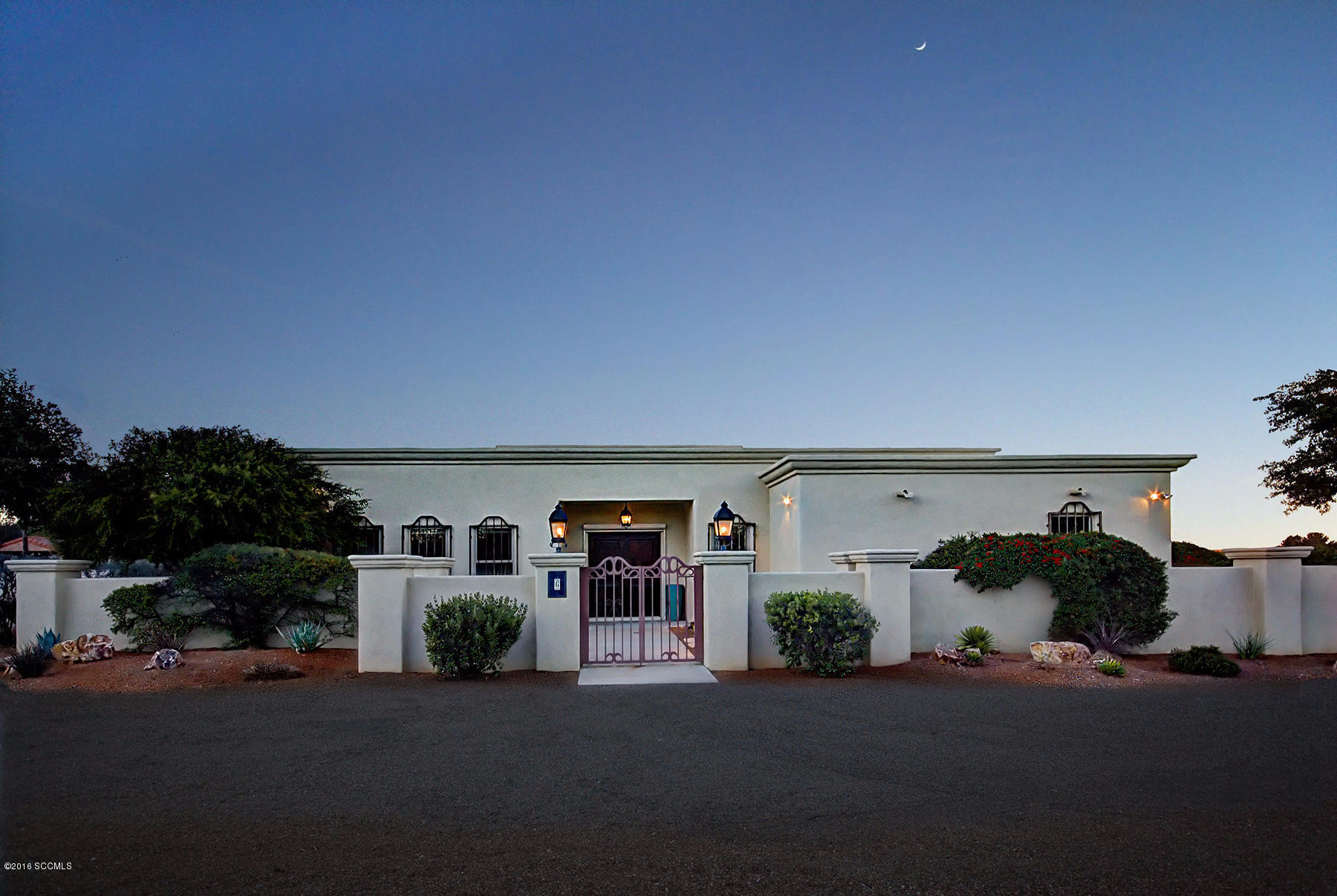 Mountain views and large covered patios surround this stunning spacious 2BR, 3BA Villaescusa home in Country Club Estates. High ceilings, beautiful mesquite floors in main rooms and kitchen. Stately fireplace divides great room and formal dining areas. Grand kitchen w/large island, prep sink, gas cook top and double ovens. Large master bedroom opens to patio. Master bath w/walk-in shower & Jacuzzi tub. Beautiful built in cabinetry in Den/BR3 w/adjoining bath. Spacious garages and storage.