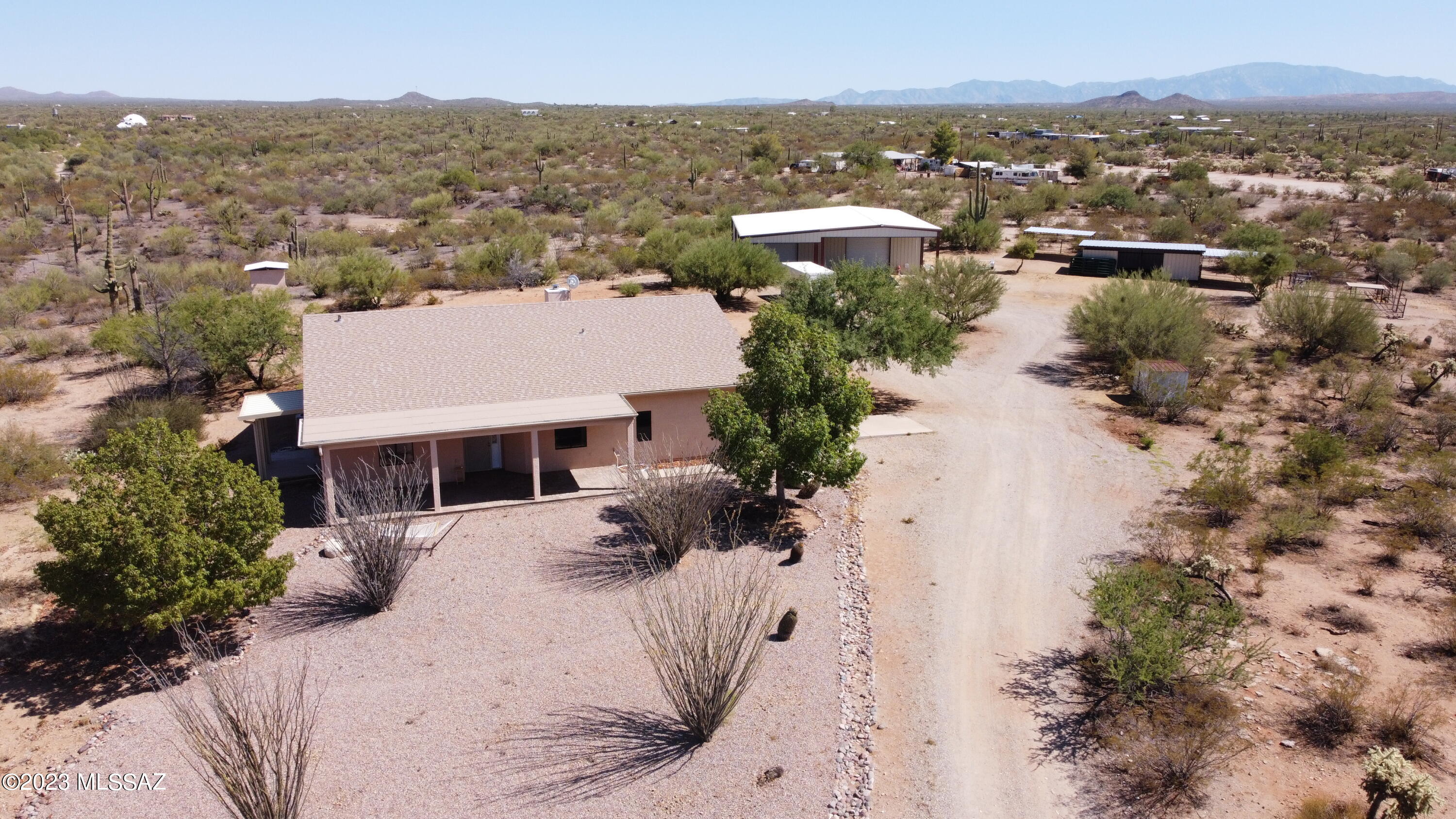 Welcome to your dream horse property nestled on 10 picturesque acres of land, with 360 degree mountain views, offering the perfect blend of tranquility and modern convenience. This meticulously maintained home boasts 3 bedrooms, 2 bathrooms, a den, and a host of desirable features that will capture your heart. As you step inside, you'll immediately appreciate the spacious and open floor plan, flooded with natural light. The den, located just off the main living area, is perfect for a home office or a cozy retreat. The 10 acres offer endless possibilities for equestrian enthusiasts or those who simply appreciate the beauty of wide-open spaces. Imagine taking morning rides on your horses through your private slice of heaven. The 40' x 50' garage/workshop is a fantastic space for DIY projects, storing your recreational vehicles, or transforming into a hobbyist's haven. It's a versatile space with unlimited potential. The property is well-equipped with a private well, ensuring a constant and reliable water supply. This home has been lovingly cared for, with many updates to enhance your living experience. In 2023, a brand-new HVAC system and water heater were installed, providing efficient climate control and peace of mind. Located in a serene and private setting, yet just a short drive from local amenities, shopping, and dining, this property offers the best of both worlds - a peaceful retreat and easy access to the conveniences of city life. Don't miss the opportunity to make this remarkable 3-bedroom, 2-bath home with a den on a 10-acre horse property yours.