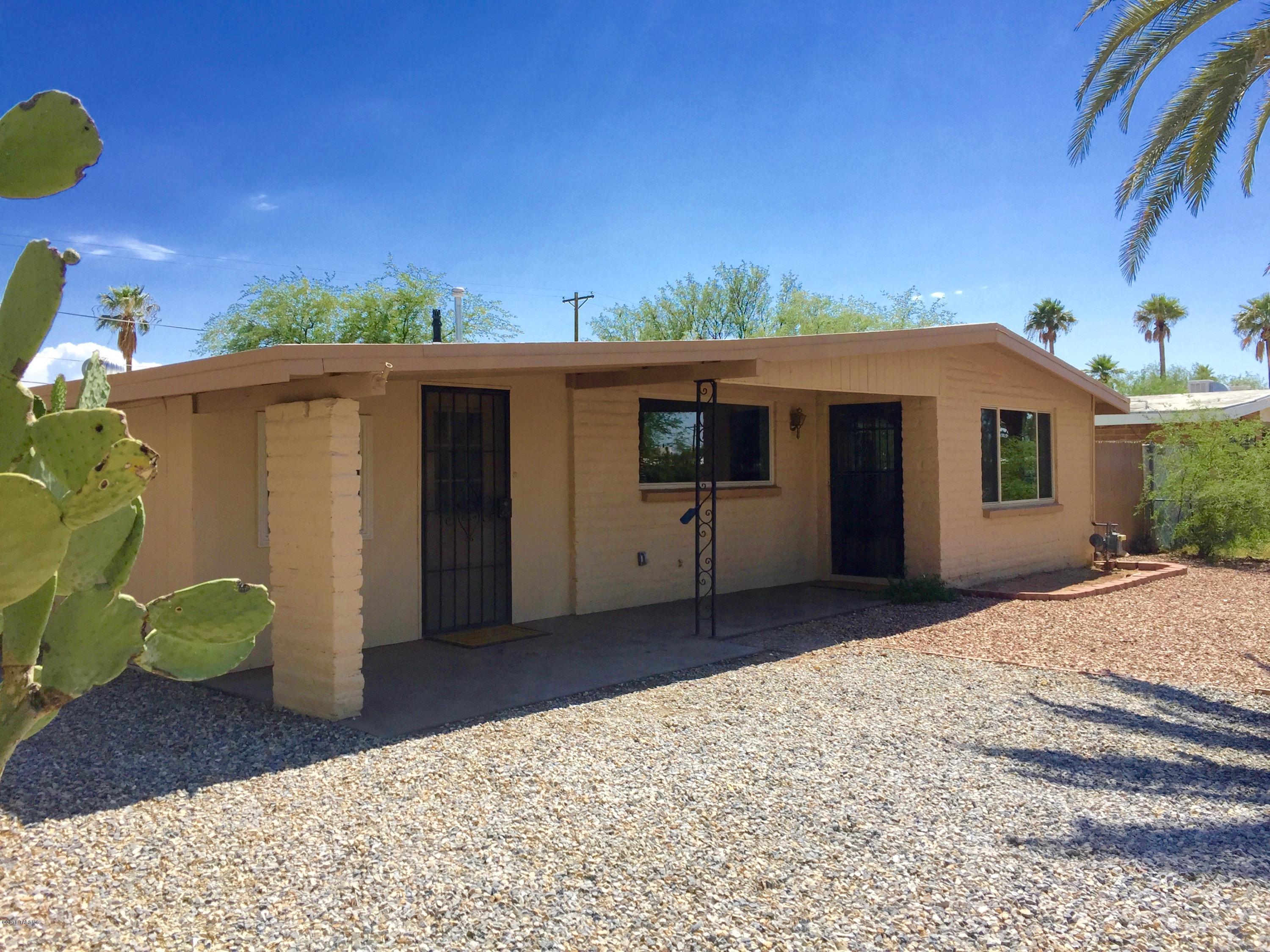 PRICE REDUCED AND KITCHEN REMODELED w/ NEW GRANITE in kitchen, new disposal & faucet too! Seller will pay $3500 towards buyer's closing costs w/ acceptable offer.  3 bed/2 bath Mid-Century home w/ modern touches. Renovated home w/ many upgrades inc. Seller Paid $10K for New Low E Windows w/ LIFETIME warranty, Tankless Hot Water Heater, 1 year old AC & heater, New tile & New Paint.  WORKSHOP in back is the perfect place for the man cave. HUGE Rec room (or extended master room/craft or hobby room/ OFFICE or Mother-in-law room) off bedroom in back. LARGE FENCED YARD. Mature Landscaping w/ palms & Grapefruit tree, New Dishwasher, 2 Fridges (as-is)  & Stove. Walk-in Pantry. Separate Dining room. Relax..comes w/ a 2-10 Warranty w/ acceptable offer. Seller is SUPER motivated to sell.
