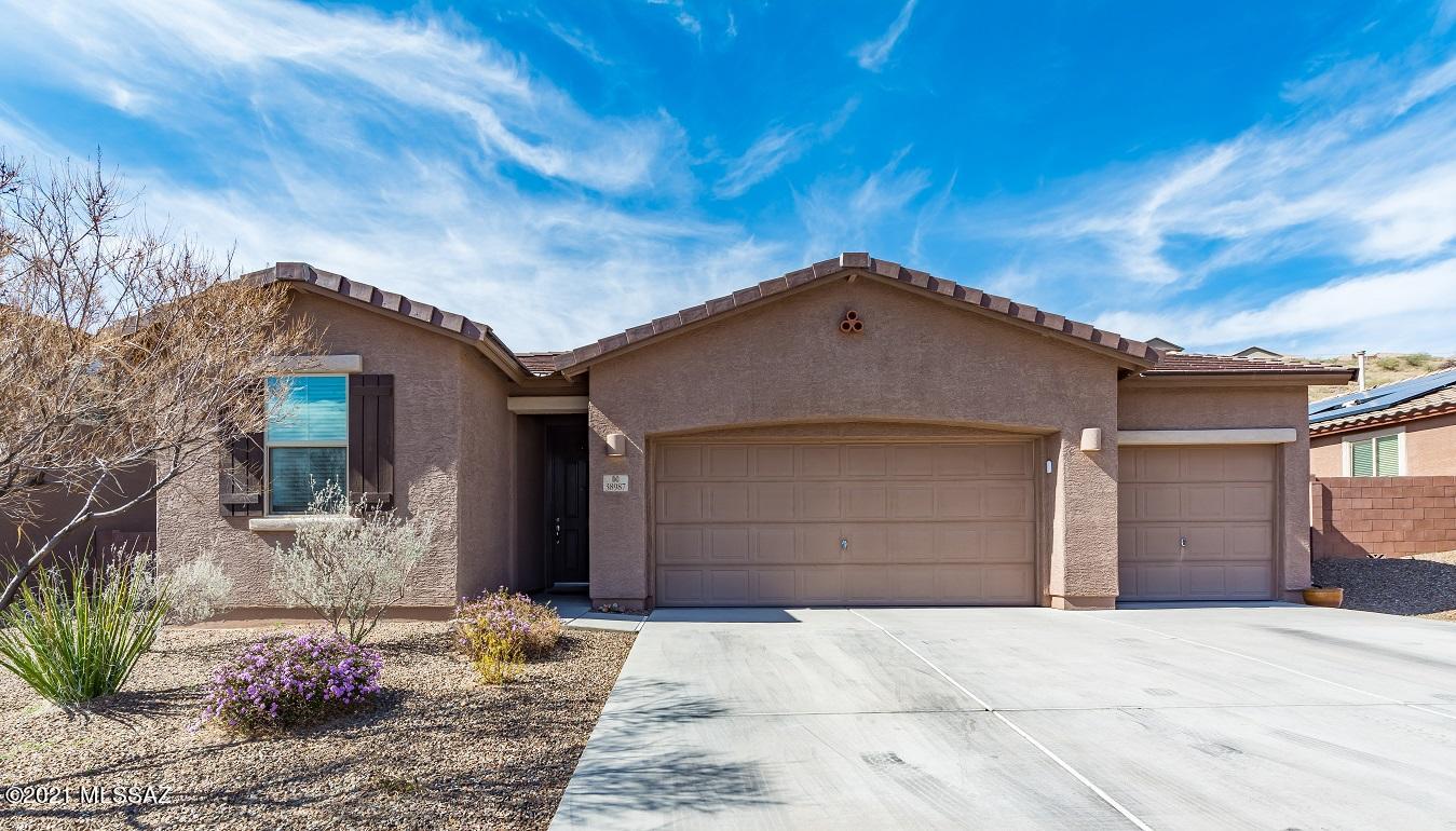 Pride of ownership shows in this well maintained Richmond American home in the desirable Eagle
Crest Ranch. New wood-looking tile floors in family room and owners bedroom and beautiful ceramic
tile in kitchen, hall, and carpet in guest rooms. Kitchen is open to the family room with high
ceilings, granite counters, cherry cabinets, large family-style island, walk-in pantry, and black
matching appliances. Ample storage, including a hallway coat and linen closet. Huge master with a
large walk-in closet. Gorgeous mountain views in front and a large backyard that backs to a common
area for lots of privacy and family BBQ's. This community enjoys a basketball court, ramadas,
parks and playgrounds for your active lifestyle. You don't want to miss this gem of a home!