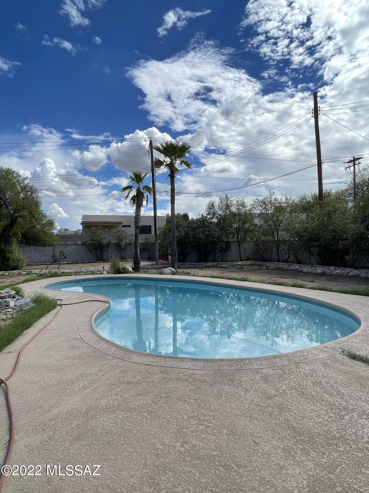 Take a look at this remodeled 4 beds 3 baths home with a swimming pool and large backyard. New Flooring, kitchen cabinets, stainless steel appliances, Quartz counter tops, double pane windows, New HVAC System and recoated Roof. Large Open space kitchen with Family room. This one is move in ready. Price range 410,000-420,000.
