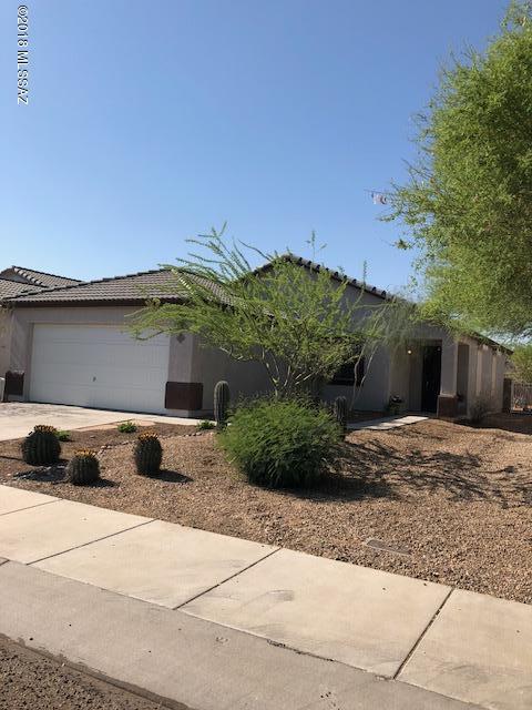 The Perfect Home...for just about anybody in much sought after NW Tucson. This 3 bdrm. 2 ba. has a  Fresh Coat of Interior Paint, April 2018, New Carpet installed May 2018, Stainless Steel Stove/Oven installed April 2018, and Over The Range Stainless Steel Microwave/ July 2018. New Granite Counter Tops along with New Stainless Steel Sink and Faucet installed May 2018. Crisp White professionally painted cabinets, June 2018.  New Bathroom Light Fixtures also installed May 2018. The Great Room has vaulted ceiling making it feel light, bright and open.  Rounding all of this it out is the neutral tile flooring and separate laundry room. Custom Peeled Log covered back patio to enjoy those beautiful Tucson painted sky sunsets Aluminum Rolling Shutters and Ornamental Metal Screens on the windows.. along with the Front and Back Door Ornamental Security Screens. Great security features for the traveler. Close to amenities: Foothills Mall, Pima College, YMCA, NW Hospital, Bus Line, Restaurants, Neighborhood park and last but not least the Dog Park. Welcome to your Dream Home!