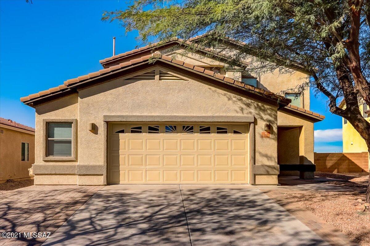 Large 4 bed 3 bath updated home in Beautiful Sycamore Canyon.  Gourmet kitchen with granite countertops, travertine backsplash, stone veneer accents and new appliances.  Brushed bronze fixtures throughout with hard wood floors, new carpet and custom interior window treatments. Enjoy amazing views from the private Master Bedroom balcony with full bath including dual sinks, garden soaking tub and separate shower. Oversized 2 1/2 car garage with 220 power service and easy access attic storage. Extended paver driveway and large private lot with rear paver patio and new exterior paint.   This one has it all, not to be missed!