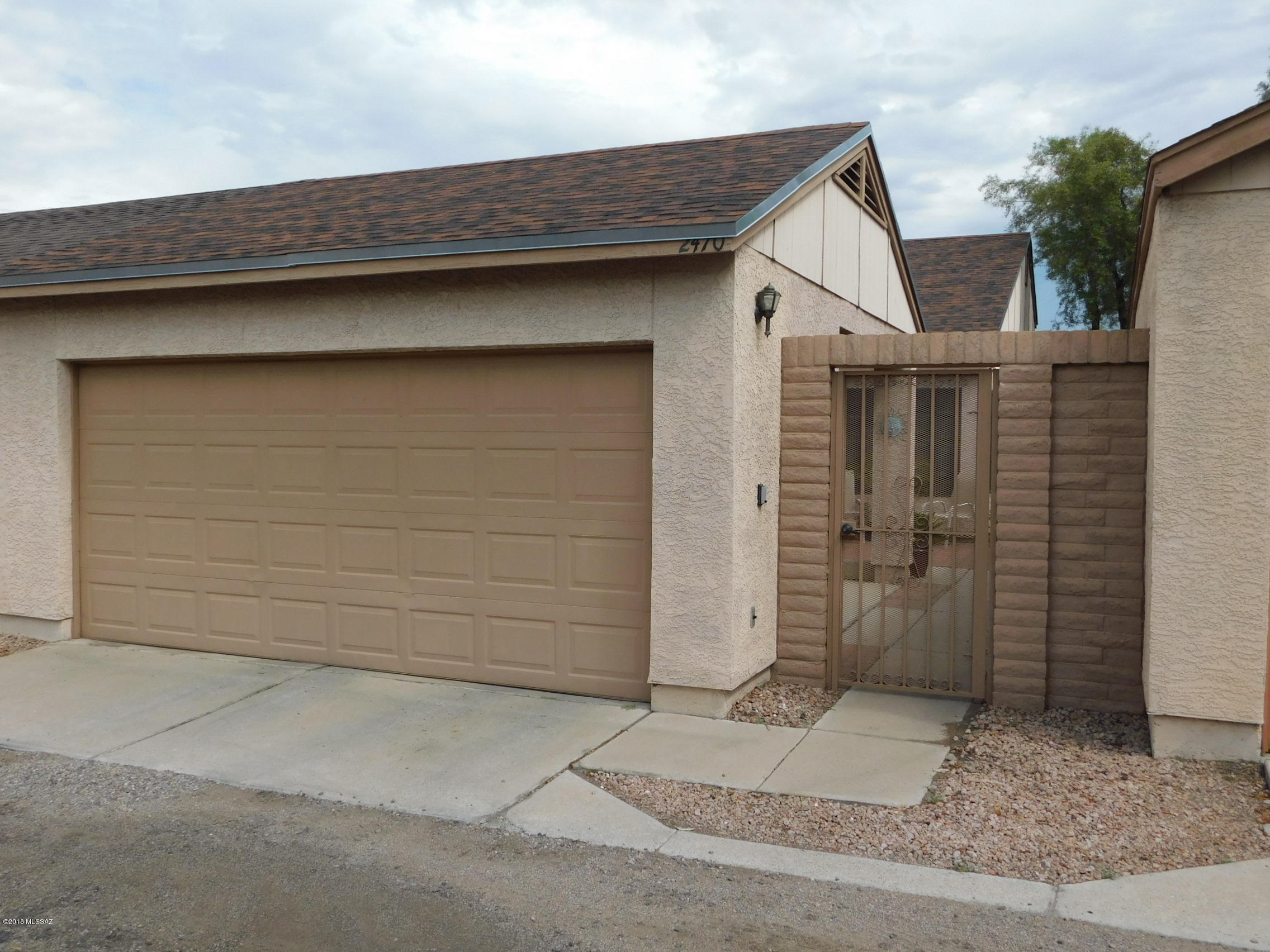 You will feel so safe and secure in this very appealing townhouse located in a gated community. This house is so comfy and secure! Cozy living room and dining room are open to the sizeable kitchen which comes complete with a laundry room! There is a large master bedroom and bathroom with a door leading out to the low-care patio. This house has a neutral color palette and is light and bright. Community comes with a beautiful pool to keep cool and entertained in the summer, and a spa to warm up in in the winter...within walking distance! Come and see this amazing home today!