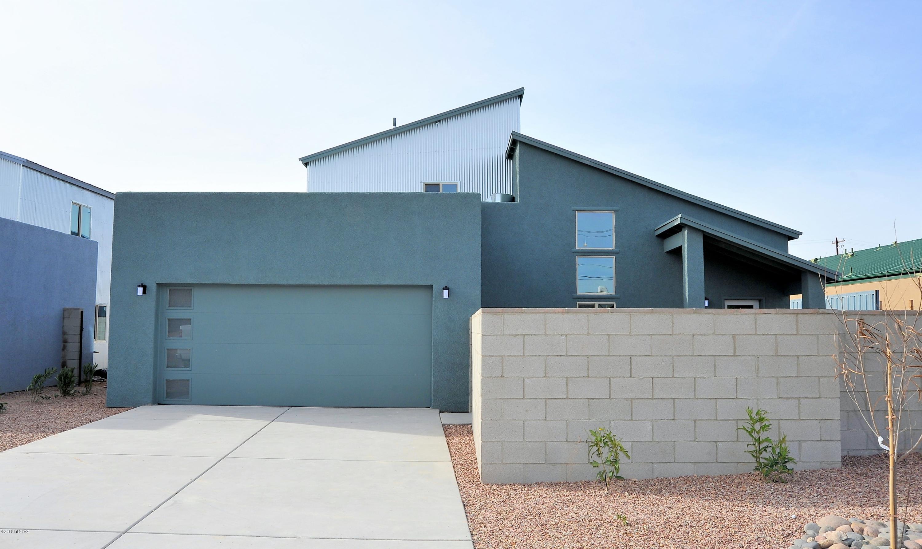 4 Brand New homes available now to occupy. This Urban Modern design is exactly what everyone is looking for. Open floorplan with a huge kitchen Island with cabinetry on both sides of the island with Quartz Countertops and bar seating for four . High ceilings, bathrooms also have quartz countertops and undermount sinks, modern plumbing features and modern lighting fixtures. Big Laundry room. Huge yards with front and back landscaping. Front Courtyard. Long concrete driveway and a 2 car garage. No HOA.Only 1 mile to the UofA campus. 1.5 miles from Downtown and just east of Armory Park. Proposed entertainment complex with two restaurant/bars will be opening on 19th st and Euclid.Just blocks away from the Lost Barrio Shops. Seven more new single story modern homes will be built on the same street in the Spring.