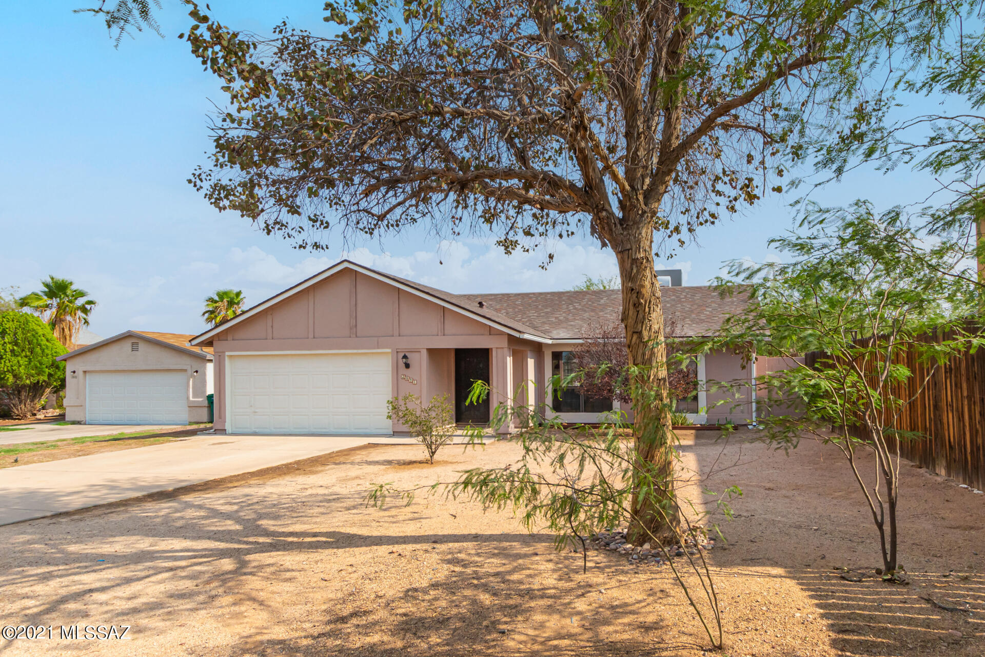 Monday 7/26 is the LAST day to SHOW - 10 offers have been received. Seller will counter or accept offers from $200,000 - $210,000. Interior boasts clean lines in favor of a sleek design with a perfectly flowing layout made bright & airy by the vaulted ceilings. New laminate wood flooring & tile throughout, and upgraded light fixtures. The kitchen is equipped with ample oak cabinets, essential appliances, plenty of counter space, pantry, and a peninsula w/breakfast bar. Impeccable main suite has a walk-in closet & a remodeled bathroom with tiled shower & granite counter. The large backyard is comprised of a covered patio & vast potential to get creative. New roof, newer exterior paint, newer AC 2015, newer hot water heater. Come see this property today!