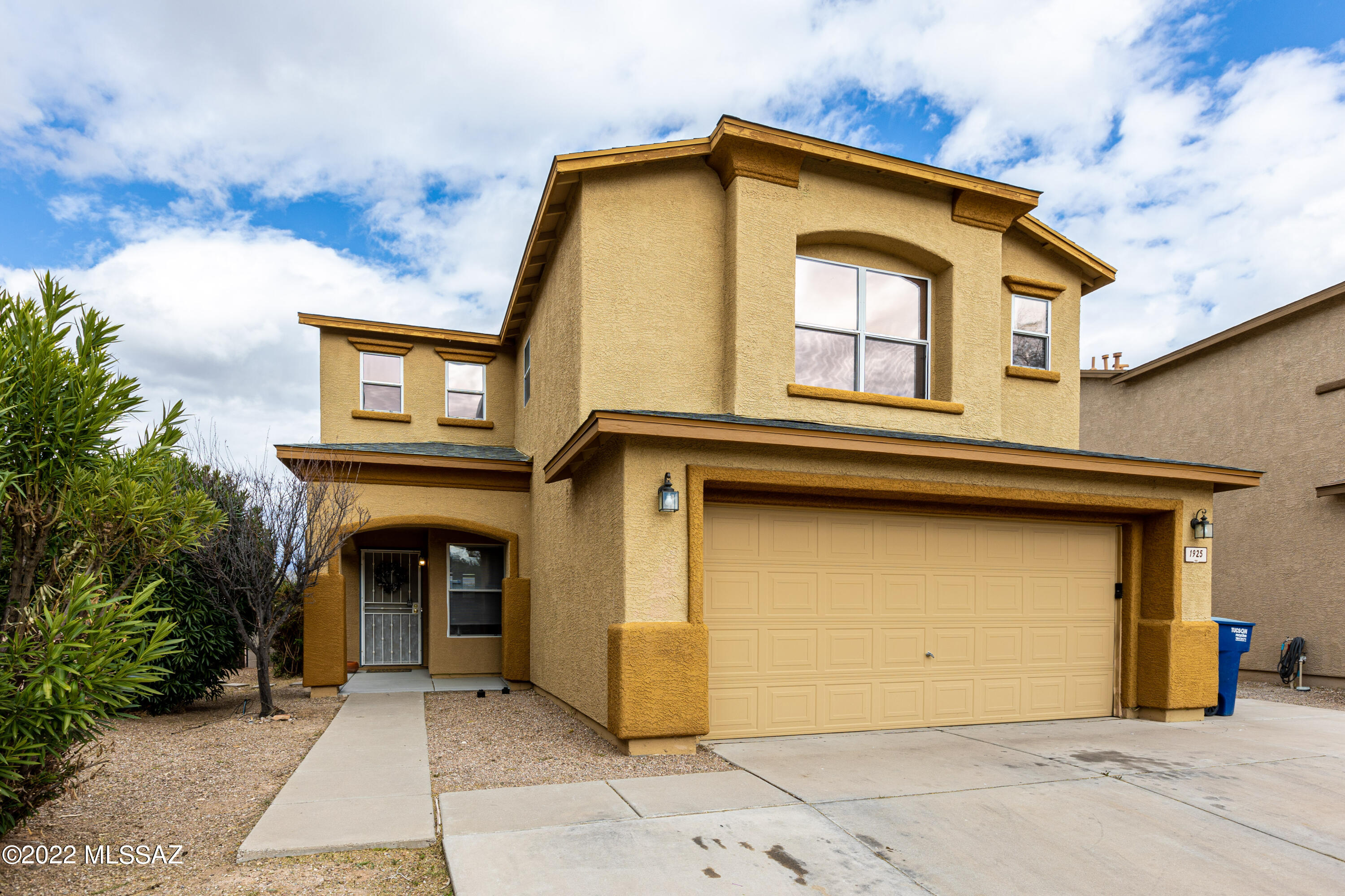 Great location, views and upgraded features in this 4 BR 2.5 Bath, east side home! Spacious open layout with fully tiled main floor that is full of nice natural light with a large great room that opens to kitchen and dining area. Kitchen has newer stainless steel stove and dishwasher, roll out shelves & granite counter-tops. Powder Room on main floor. Extended patio to enjoy the city & mountain views to the NE, premium cul de sac lot & no neighbor behind. Upstairs newer carpet, over-sized Owner's Suite with 2 walk-in closets, executive height dual vanity in bath. 3 additional Bedrooms + full bath & large laundry room. One owner licensed realtor in AZ. Radiant Shield insulated roof, new roof in 2017, extra driveway pad.