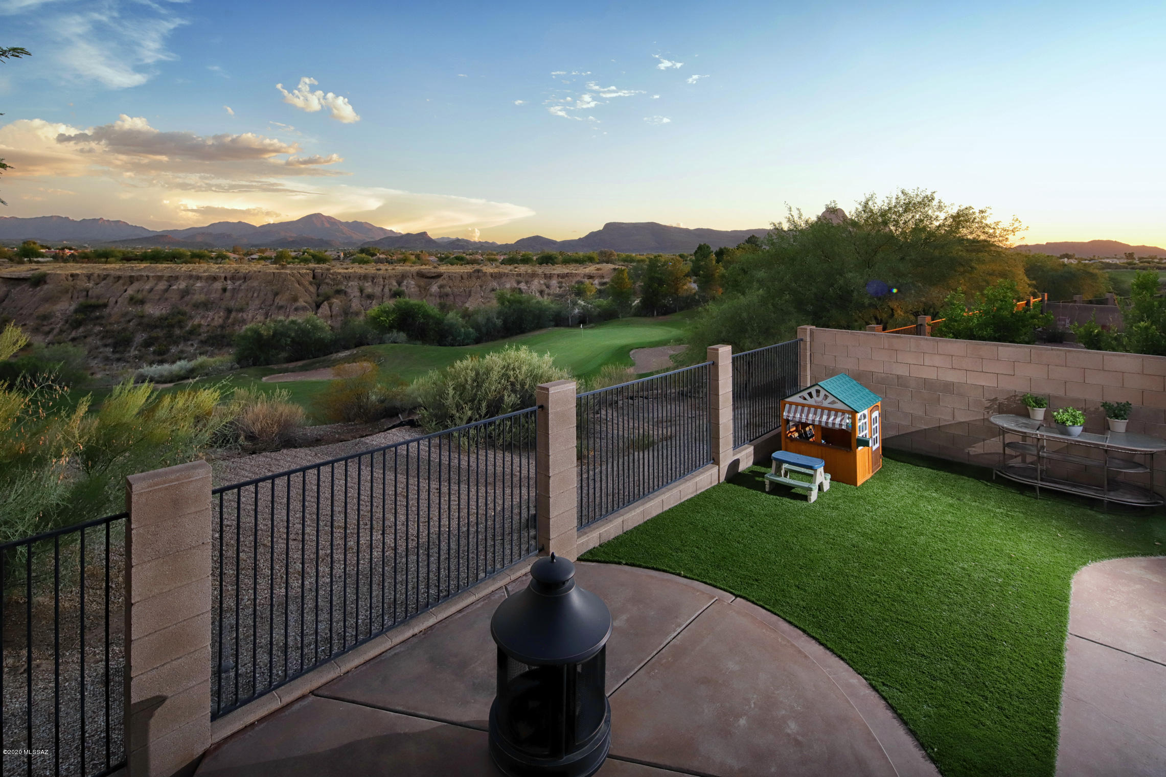 Stunning 3 bed/2 bath southwestern style home available on a coveted golf course lot in The Pines. Excellent northwest Tucson community, located just minutes from shopping, restaurants and the I-10. Immaculate interior is sure to impress with tasteful high end finishes from all to wall. Beamed ceilings, custom paint tones and beautiful tile flooring in all of the right places. Designed for entertaining, the open concept kitchen boasts granite countertops, stylish backsplash, a pantry, an island and a breakfast bar. Spacious office/den with built in cabinets. Owners suite is complete with a walk in closet and a full en-suite with dual sinks and a separate tub and shower. Amazing backyard offers a hot tub and breathtaking golf course and mountain views. This gem is a must see. Don't miss it.