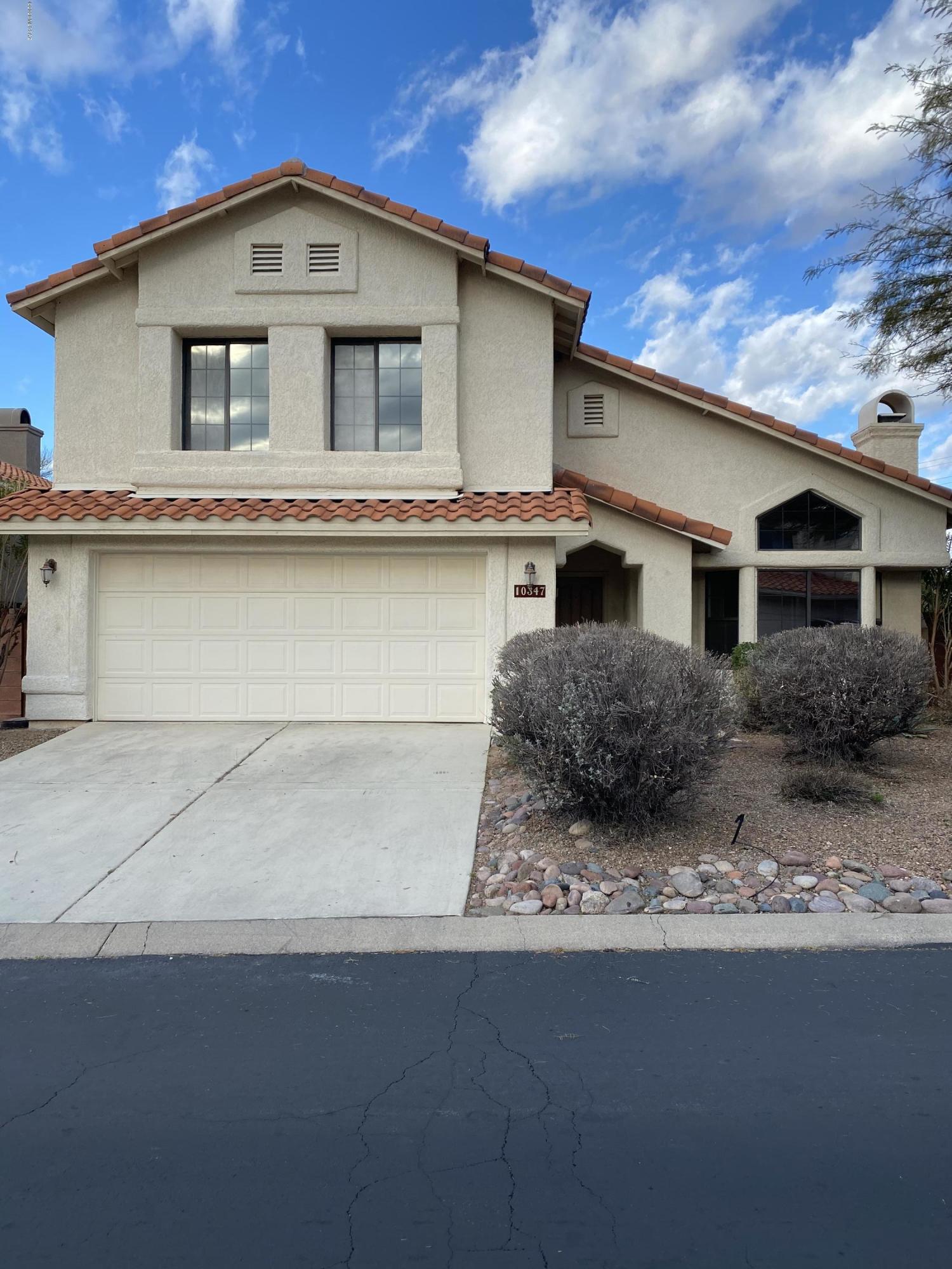 This Very Impressive four bedroom, three bath home with additional home office is conveniently located in the desirable gated community of The Villages of La Canada. Minutes from El Conquistador Golf Course and Tennis Club, Oro Valley Market Place and Canyon Del Oro Riverfront Park. The kitchen has been updated with Granite countertops, Recessed Lighting, Stainless Steal appliances to include Double-Gas Oven/Range by Maytag (Gemini Series), Commercial Grade Range Master Vent by Broan-Nutone, Bosch Dishwasher, and built in Trash Compactor by Kitchen Aid. This homes bright open floor plan flows beautifully with custom diagonal 18x18 porcelain tile throughout, fireplace in the main living area, Double pained tinted windows for energy efficiency.