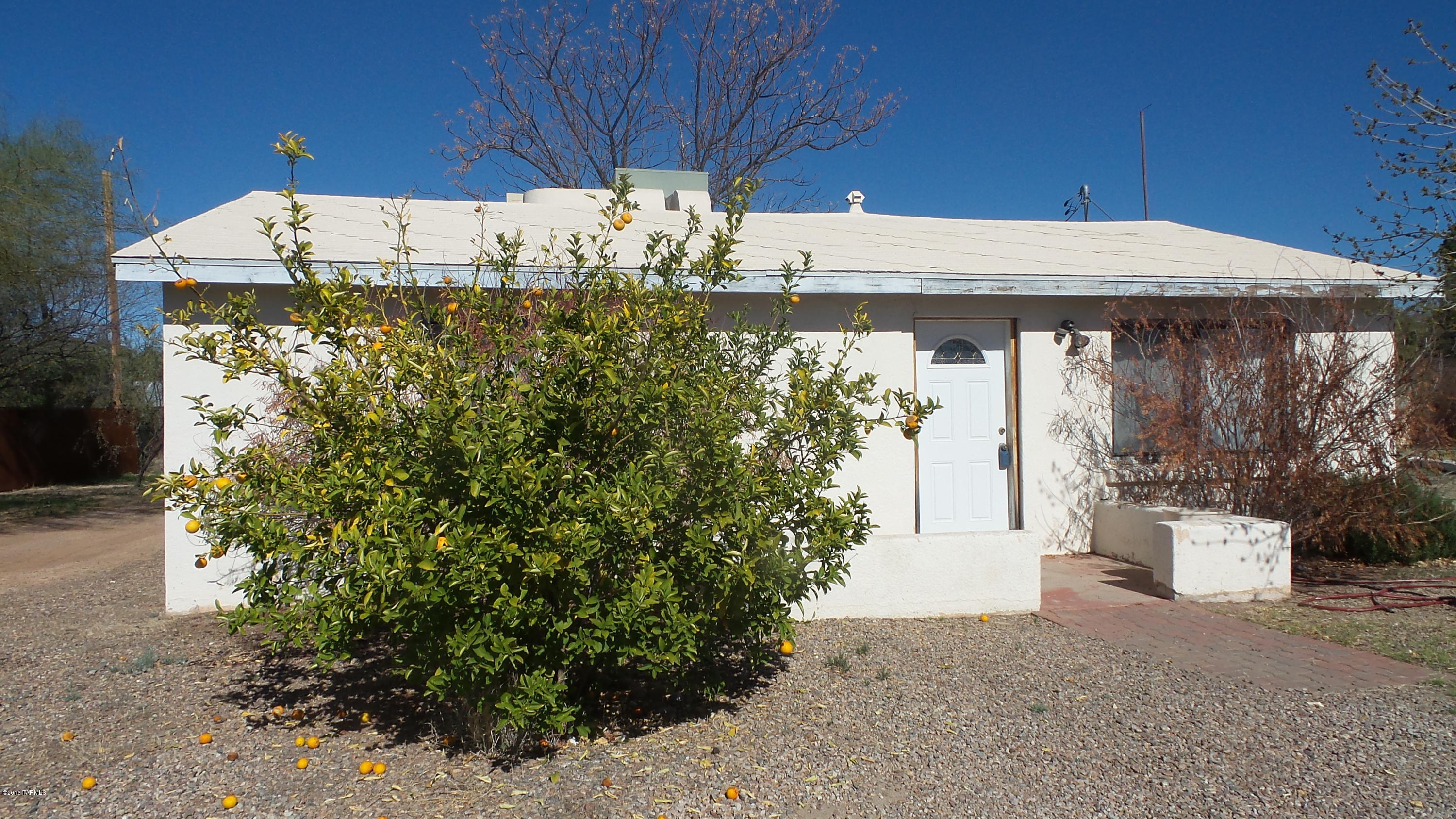 Substantial price reduction! 2 Bedroom House with 1 Bedroom guest house, both complete with full kitchens, patio covers, laundry facilities,and Gas & Electric utilities are metered separately. Windows are double pane. Units have been rented to family members previously, so no actual Income figures.  Nice large lot with plenty of room for parking, outdoor space and separately fenced in areas. 3 sheds convey with property.  Property & personal property are sold As-Is, Current owners will not pay for any repairs. Only the dryer in the front unit and the refrigerator in the rear unit conveys with the property.
