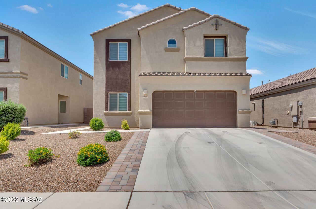 If you're looking for a pristine, move-in ready home with a 1st floor guest room and full bathroom, look no further. This home offers a spacious great room, beautiful granite counters on white cabinets, a walk-in pantry with a frosted glass door, stainless steel appliances, and a gas range. The upper level provides additional living space with a loft, a large master bedroom, and 3 additional guest bedrooms. The laundry room is on the 2nd floor. Ceiling fans and French blinds add to the appeal of this lovely home. You'll enjoy hours of entertainment in the beautifully landscaped back yard with an extended covered patio and additional pavers with Pergola. Follow the paved walkway to an attractive built-in wood burning fireplace that will warm you on the cool desert nights.