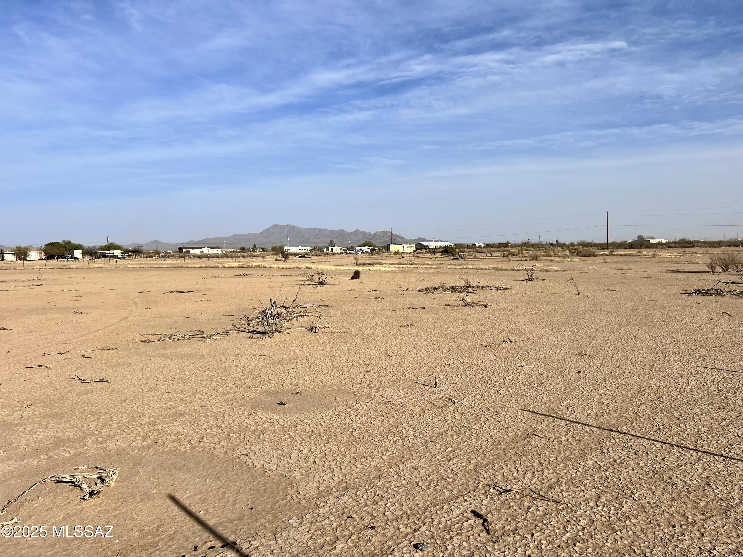 Don't miss this opportunity to own rural land at a fantastic price! Nestled on 2.5 acres, this quiet retreat is perfect for off-grid living or simply getting away from the hustle and bustle. Spread out and make your dream home in the tranquility of nature. Seller carry available, call for details! 520-861-3320
