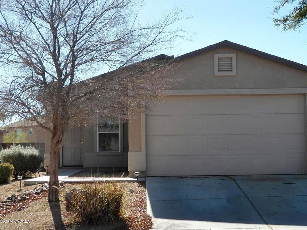 Sparkling clean 3 BR/2 BA & Den single family home built in 2005. Large eat in kitchen with all appliances, butcher block island and breakfast bar. Neutral beige tones thru-out including 16'' tile in all rooms except bedrooms. Laundry room has W/D. Covered Flagstone patio, rear privacy wall and next to arroyo. Take a look. You will not be disappointed.