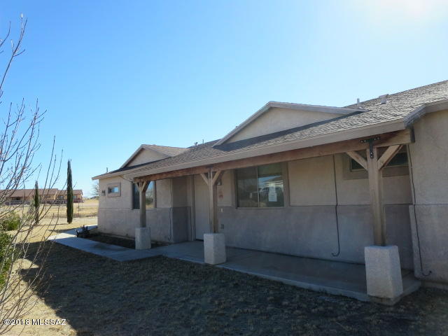 4 bedroom 2 bathroom Home with 3 car garage on almost 1 acre. Mountain views from covered back patio and front porch. Plenty of room for your garden and pets. Large Kitchen with Breakfast Bar that opens up to Dining area and Living Room. The Master Bedroom is separated by the living area from the 3 Guest Bedrooms. With some TLC you can make this place your own.